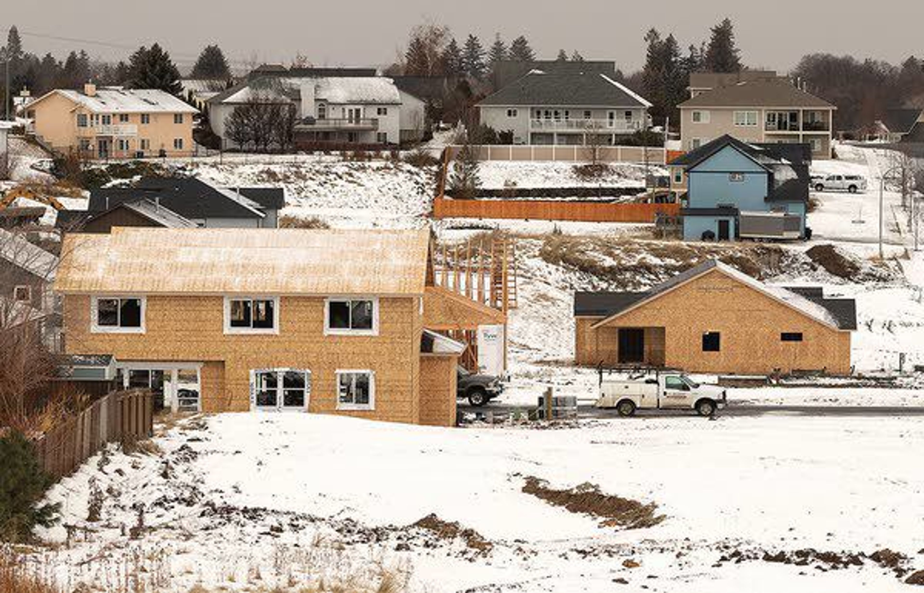 Several houses are under construction at the intersection of East Third and East Sixth streets Tuesday in Moscow.