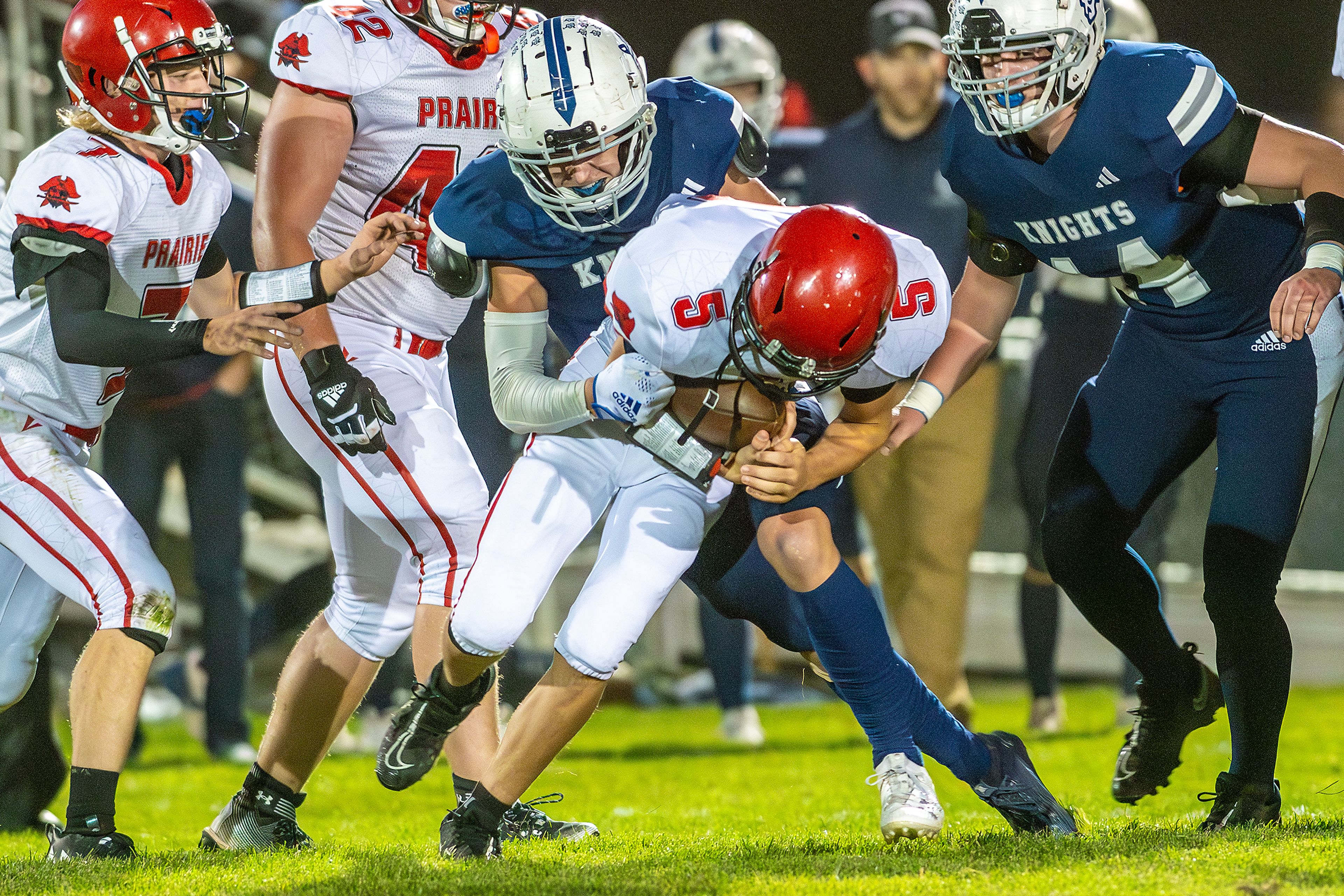 Prairie Phil Schwartz is tackled by Logos Ryan Daniels after intercepting a Logos pass during a conference game Friday in Moscow.,