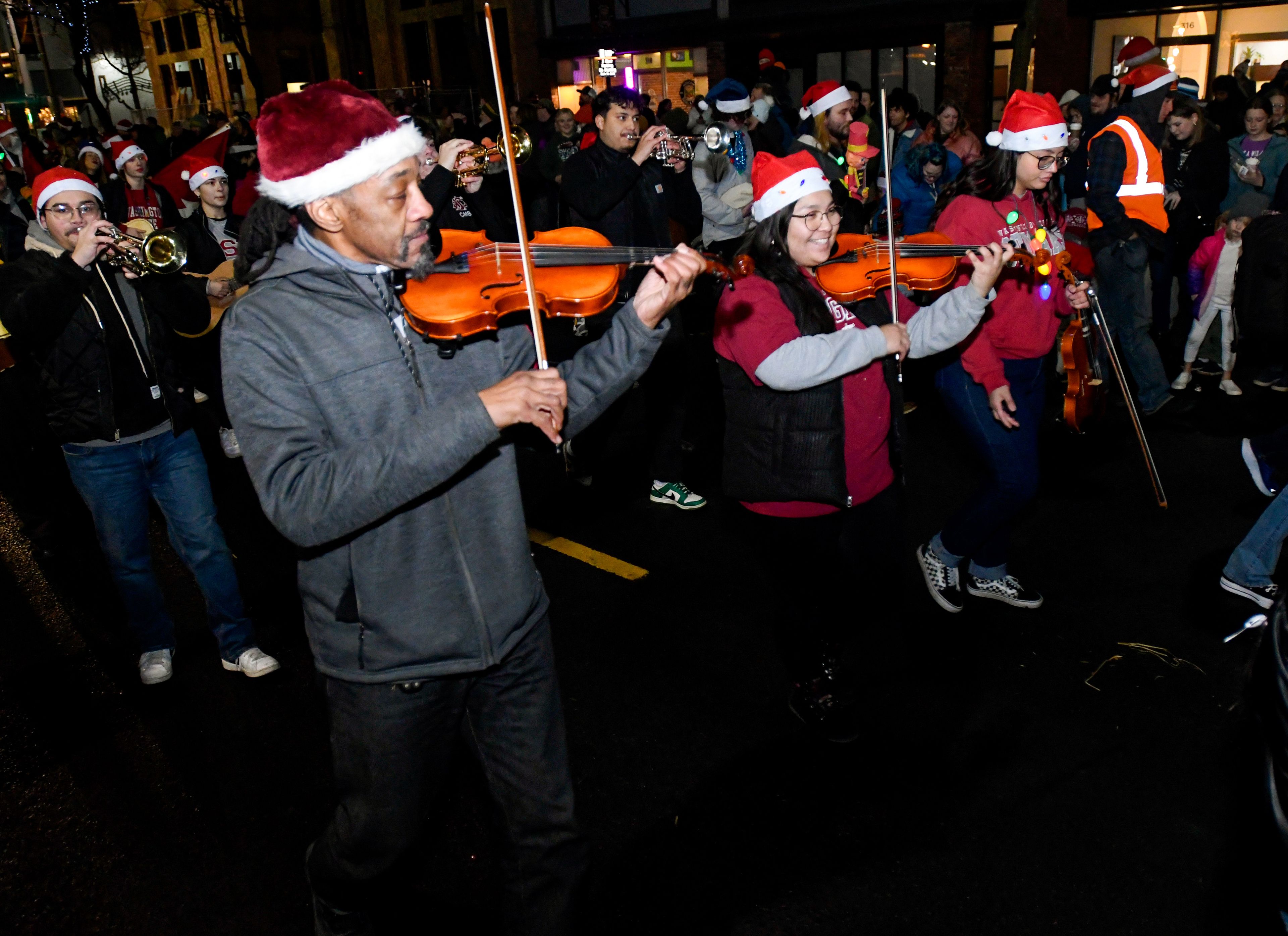 Washington State University’s Mariachi Leones Del Monte plays in the Light Up the Season parade on Thursday.