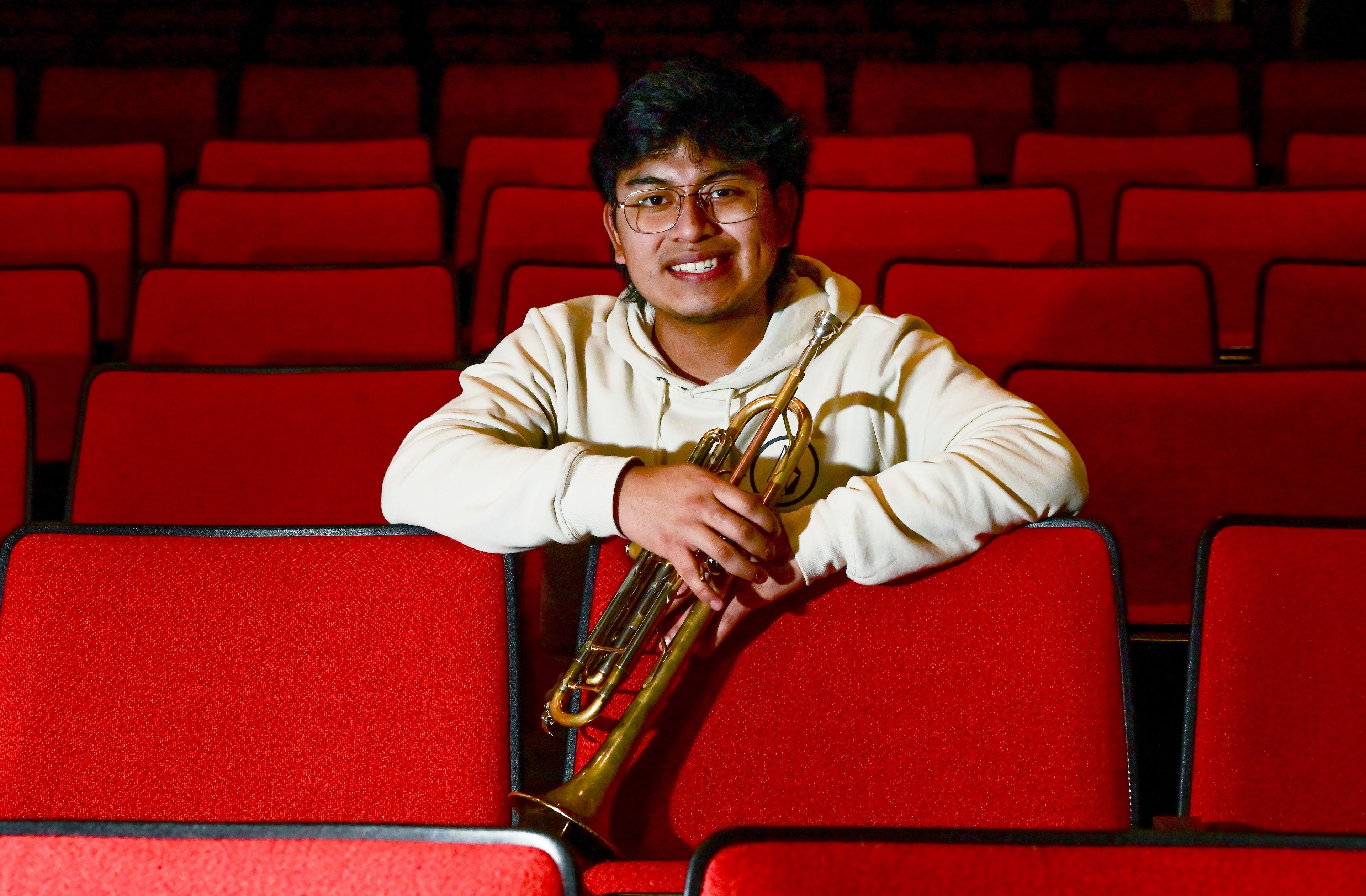 Moscow High School junior James McKinley holds his trumpet in the auditorium at the school on Wednesday. McKinley was selected to play in the 2024 All-American D-Day Band, which will perform in Paris and Normandy.