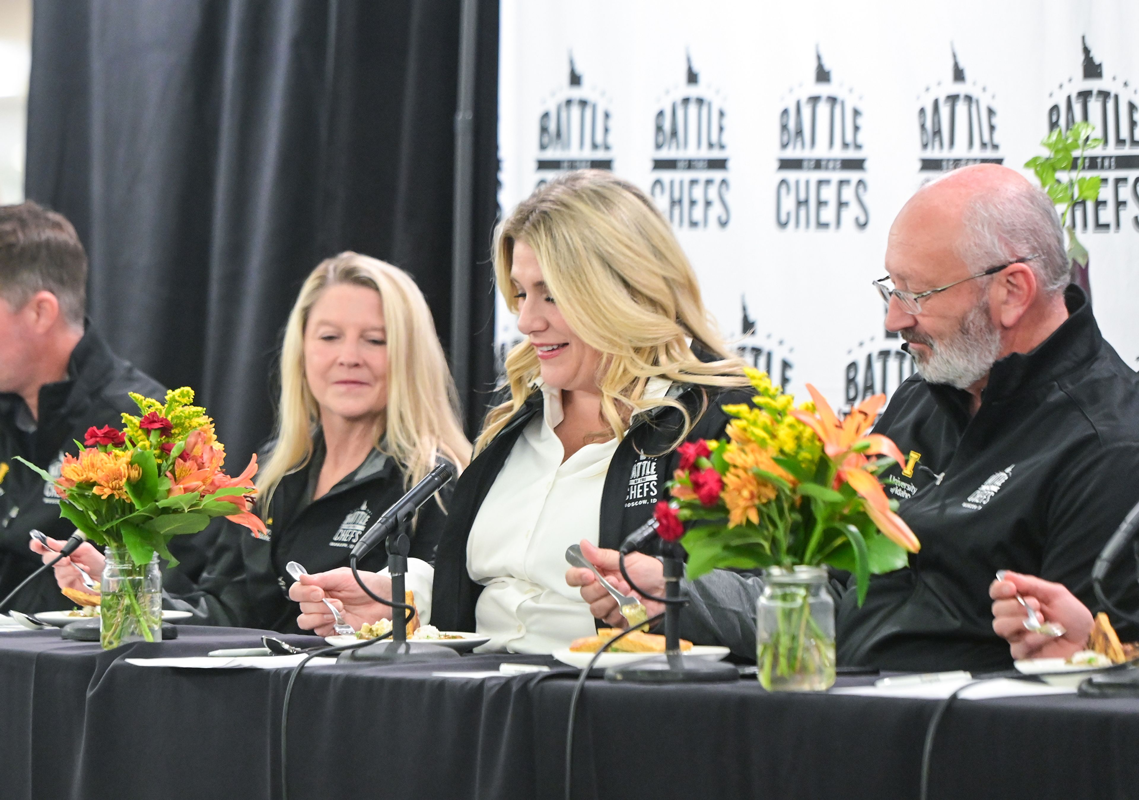 Judges from local food companies and colleges across Idaho take their first bites of a dish from Chef Roland Cruz, an executive chef with Boise State Dining, during the Battle of the Chefs Wednesday at The Eatery on University of Idaho campus in Moscow.