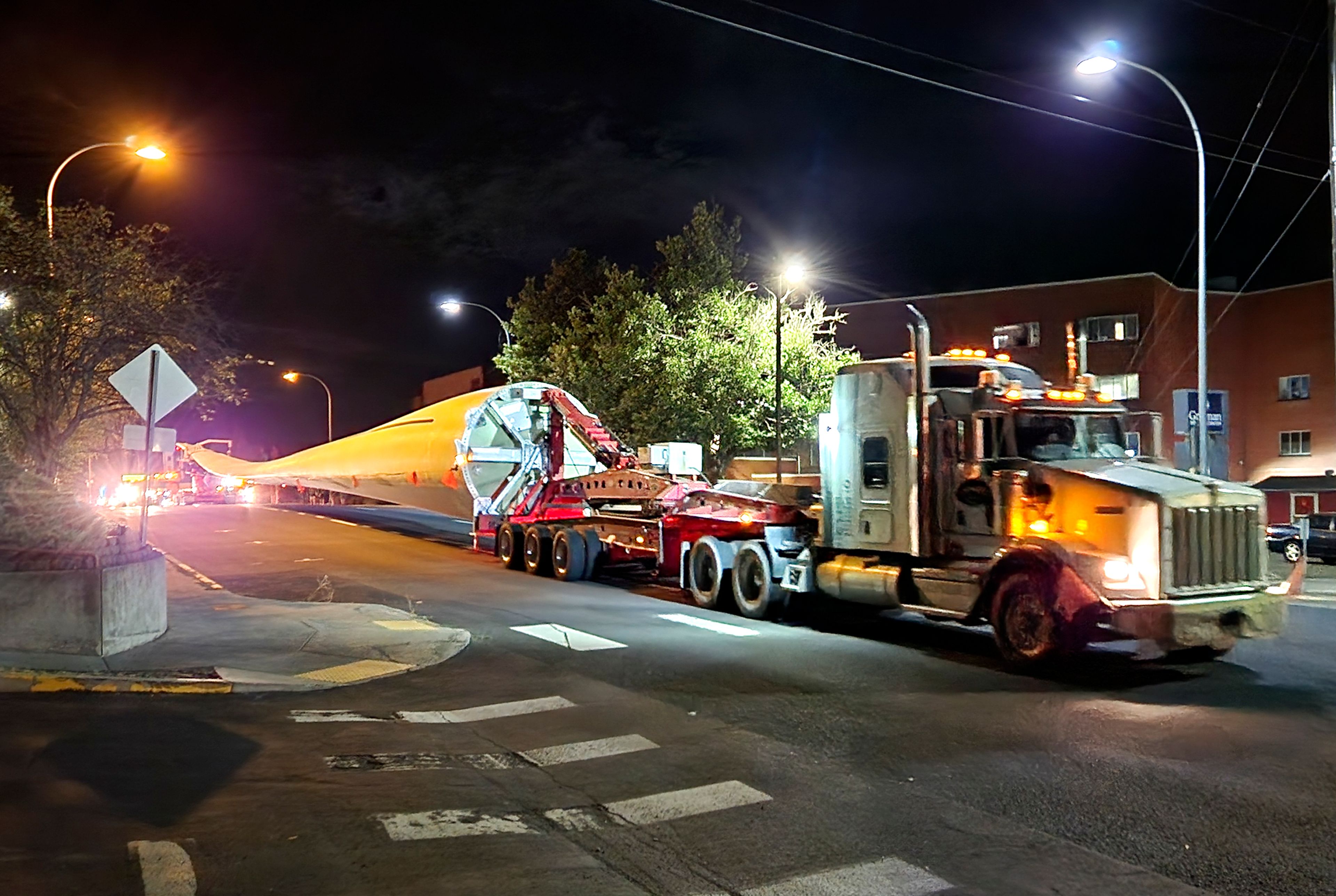 A wind turbine blade is transported through Moscow.