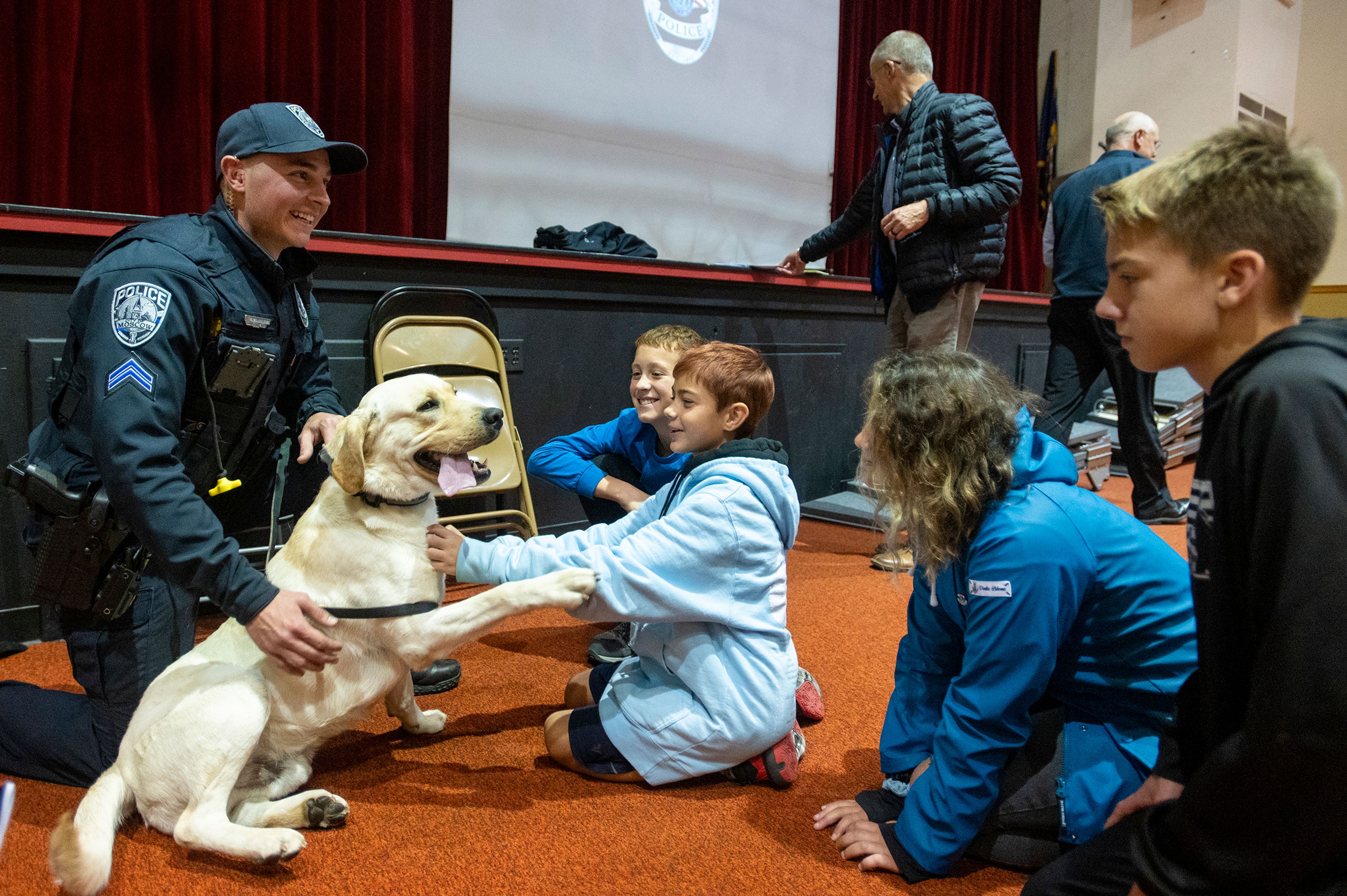 Cpl. Ryan Snyder introduces Ragnar, a drug detecting K-9, to an audience Tuesday during a drug awareness presentation from the Moscow Police Department in honor of Red Ribbon Week at Moscow High School.