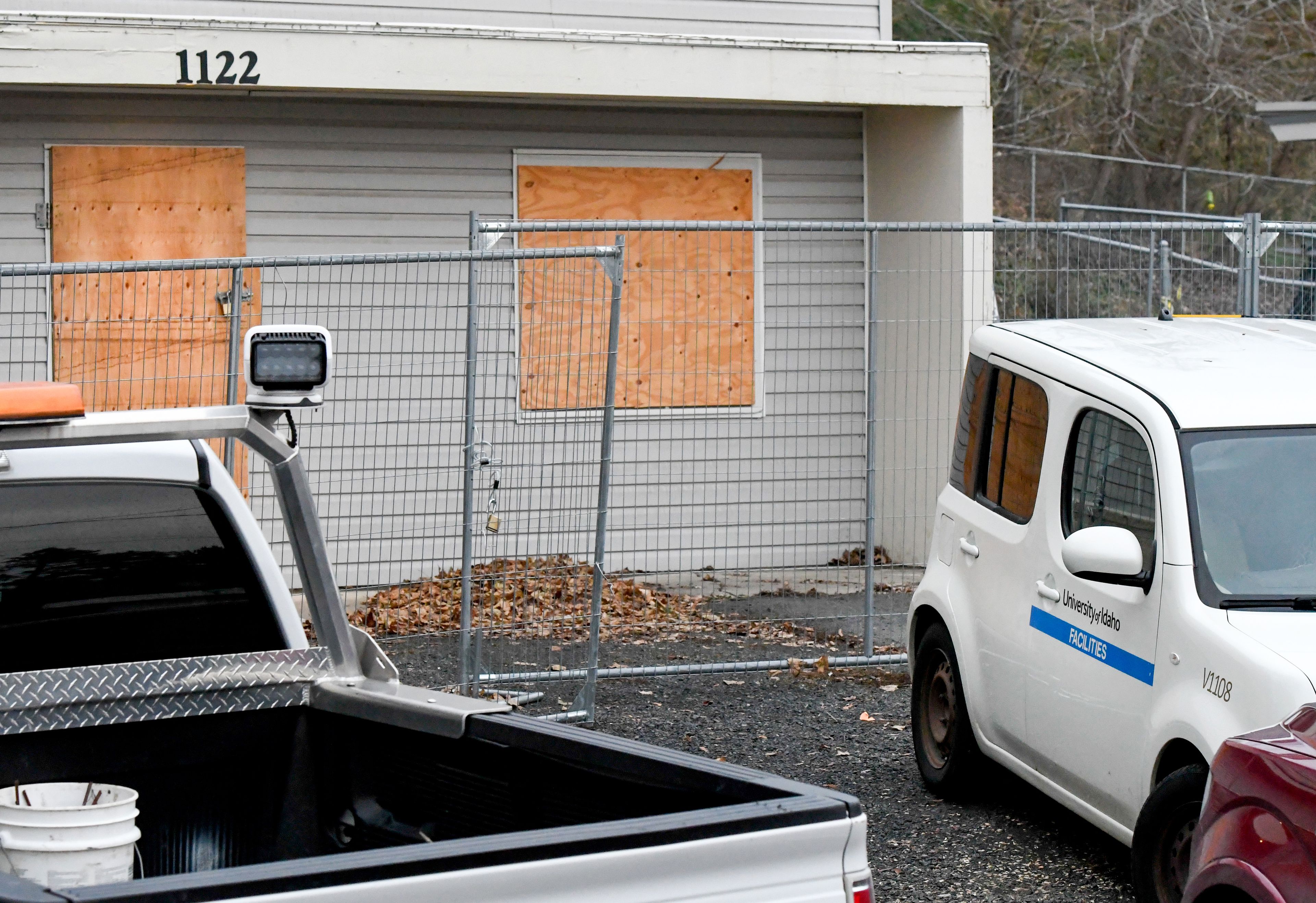 University of Idaho facilities vehicles park on Thursday in front of the King Road house where four University of Idaho students were killed last year in Moscow. The college announced that the defense team for suspect Bryan Kohberger will be given access to the house Thursday and Friday as it prepares its case for a trial.