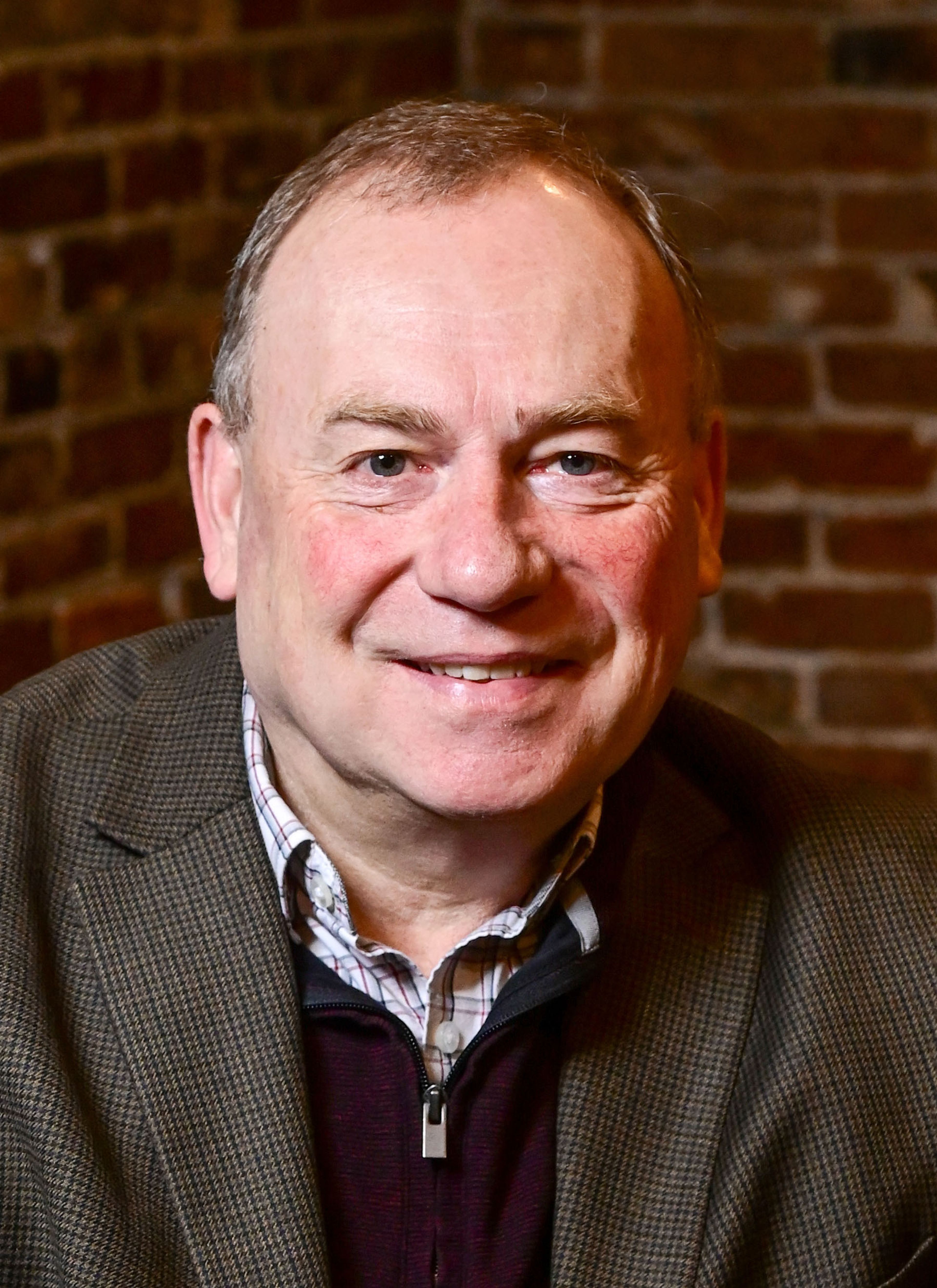 Incoming Pullman mayor Francis Benjamin sits for a portrait at Neill's Coffee & Ice Cream in downtown on Tuesday.