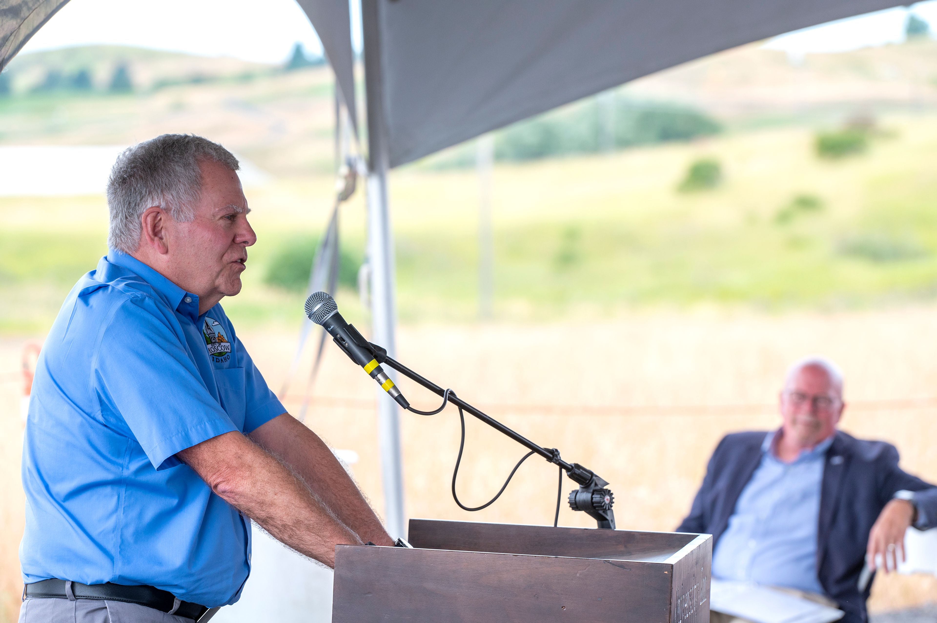 Moscow Mayor Art Bettge speaks to a crowd during a groundbreaking event for the new Pullman-Moscow Regional Airport terminal.