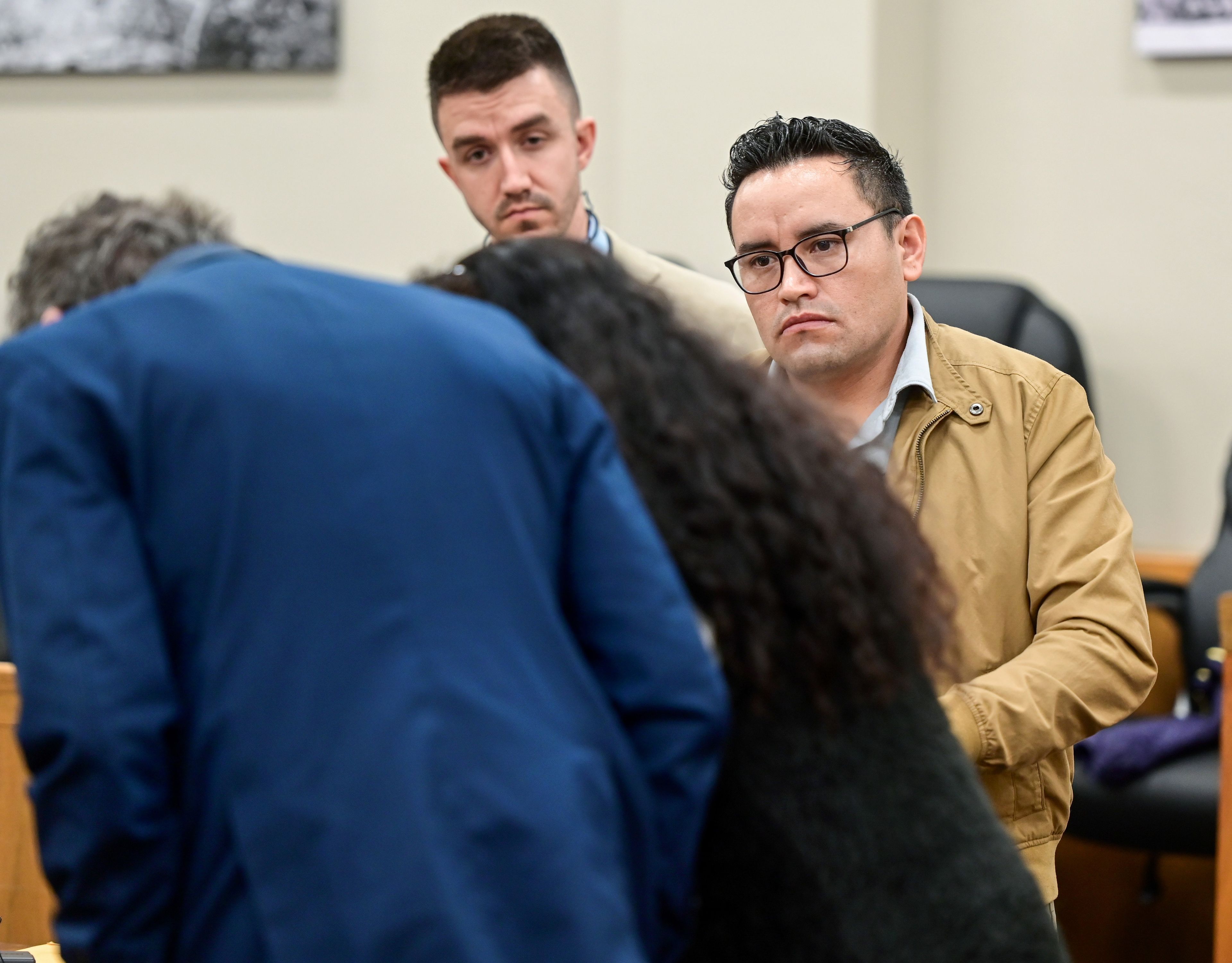 Juan Trejo Perez, right, stands next to translators and his defense attorney during a break in Trejo Perez’s Whitman County Superior Court jury trail in Colfax on Tuesday. A jury will choose whether to convict the 34-year-old Trejo Perez of felony third-degree child molestation.