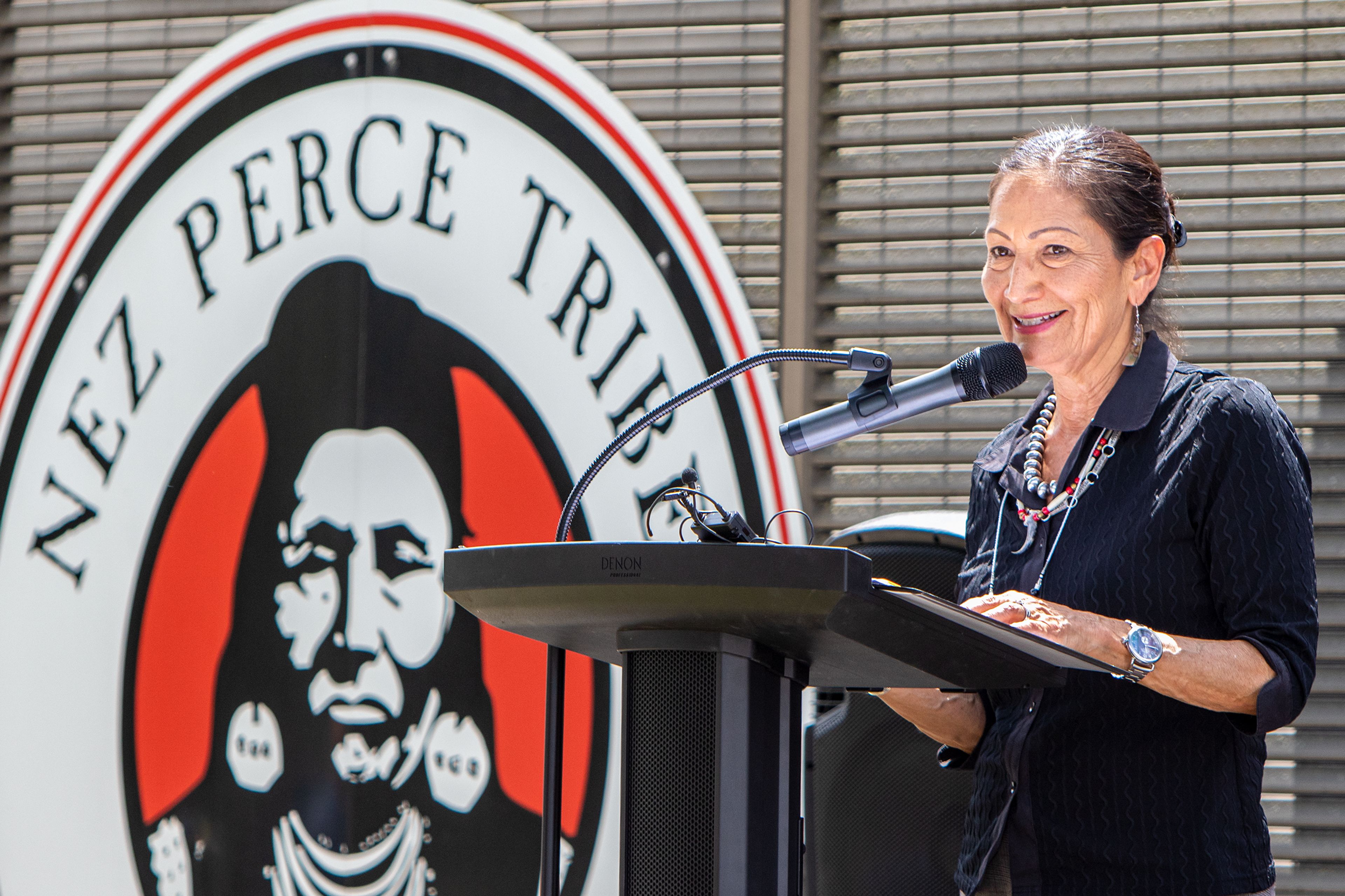 U.S. Secretary of the Interior Deb Haaland addresses the crowd Thursday during a ceremony marking the transference of responsibility regarding fish production at the Dworshak Fish Hatchery in Orofino from the U.S. Fish and Wildlife Service to the Nez Perce Tribe.