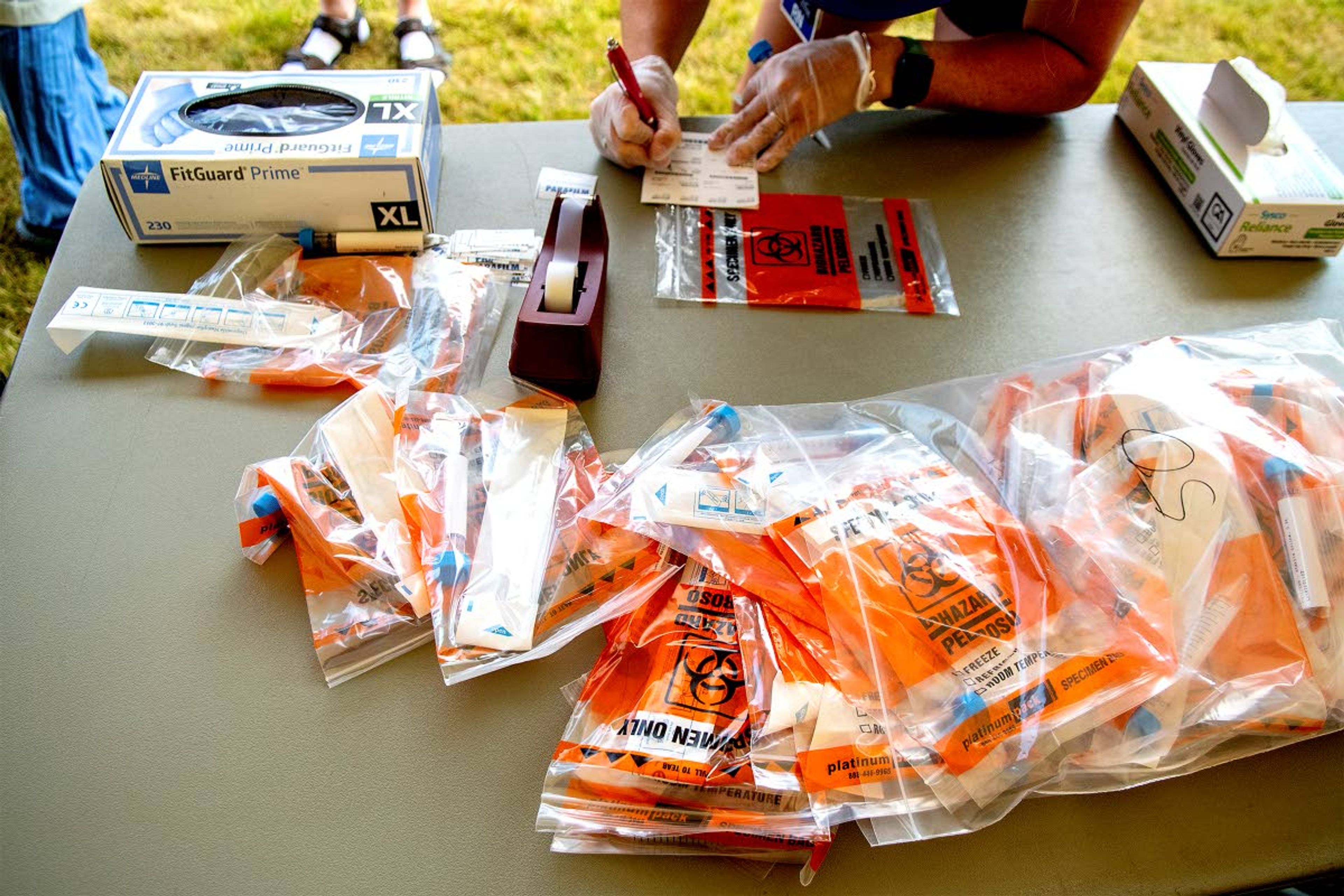 Bags of COVID-19 testing kits sit out on a table on Wednesday during a trial run of the testing procedure the University of Idaho will follow as students return.