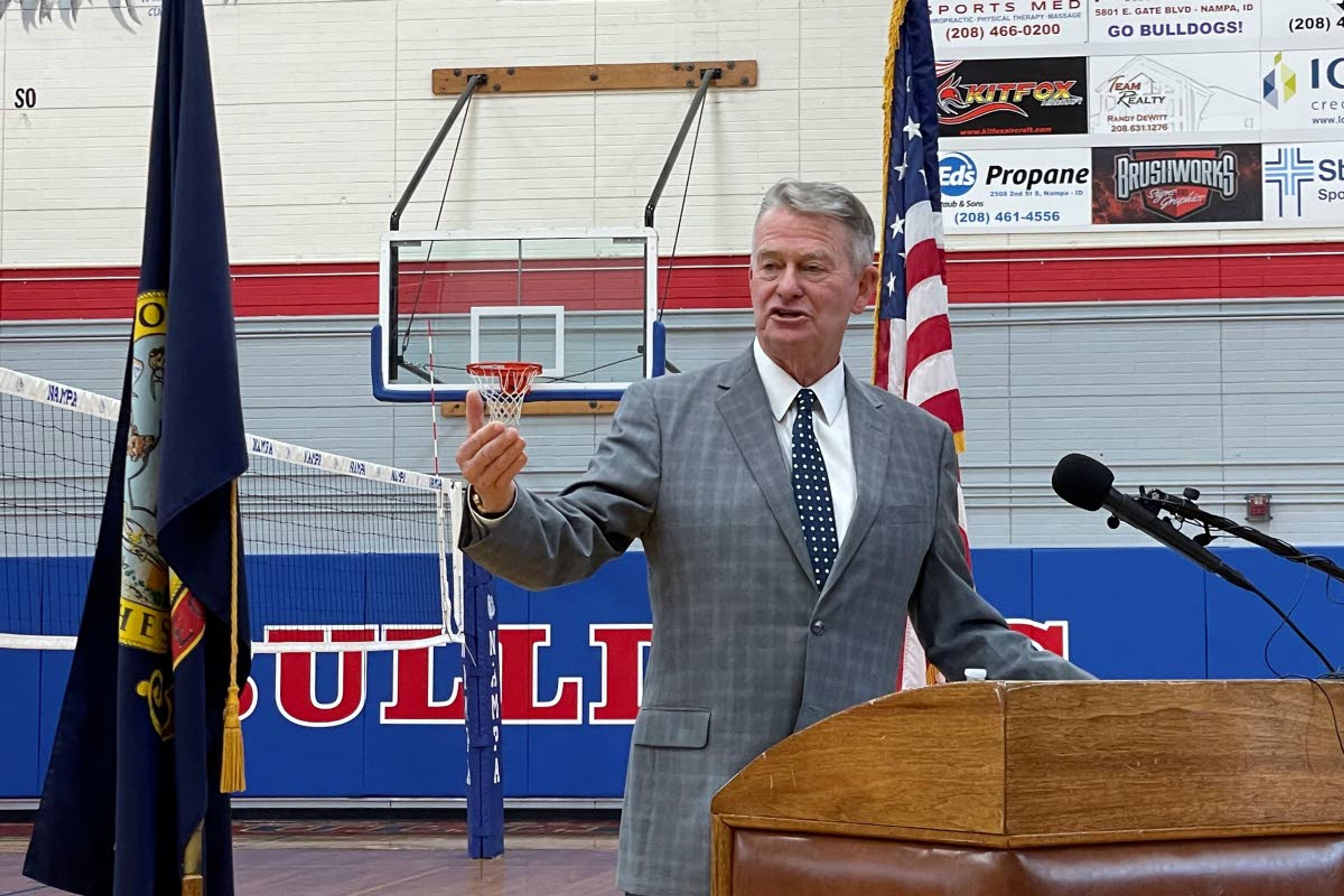 Associated PressIdaho Gov. Brad Little urges people to get vaccinated against the coronavirus during a visit to Nampa High School in Nampa, Idaho, on Thursday.