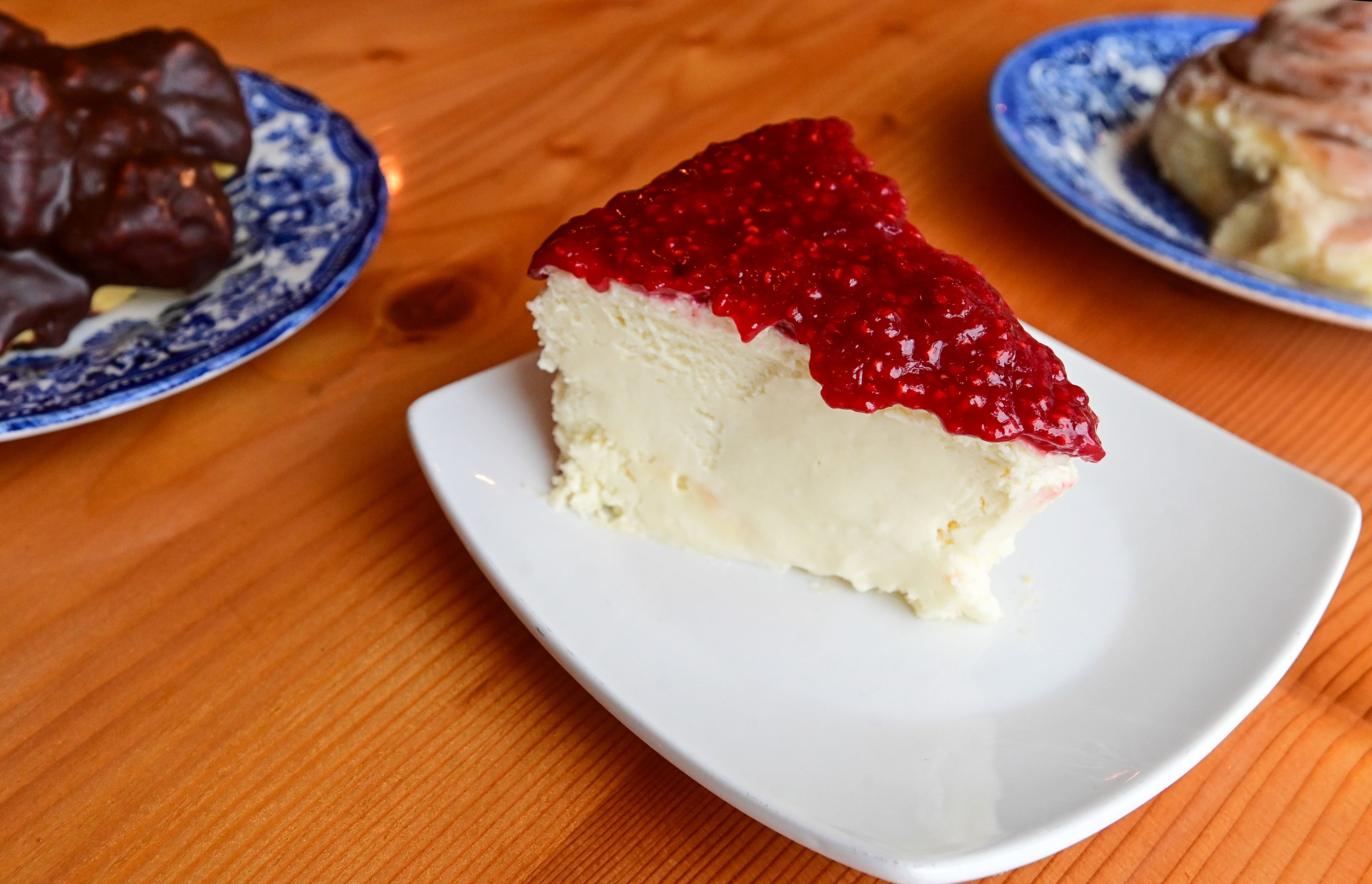 Chocolate cream puffs, left, raspberry cheesecake, center, and cinnamon rolls are among the pastry items available at The Pie Safe Bakery in Deary on Wednesday.