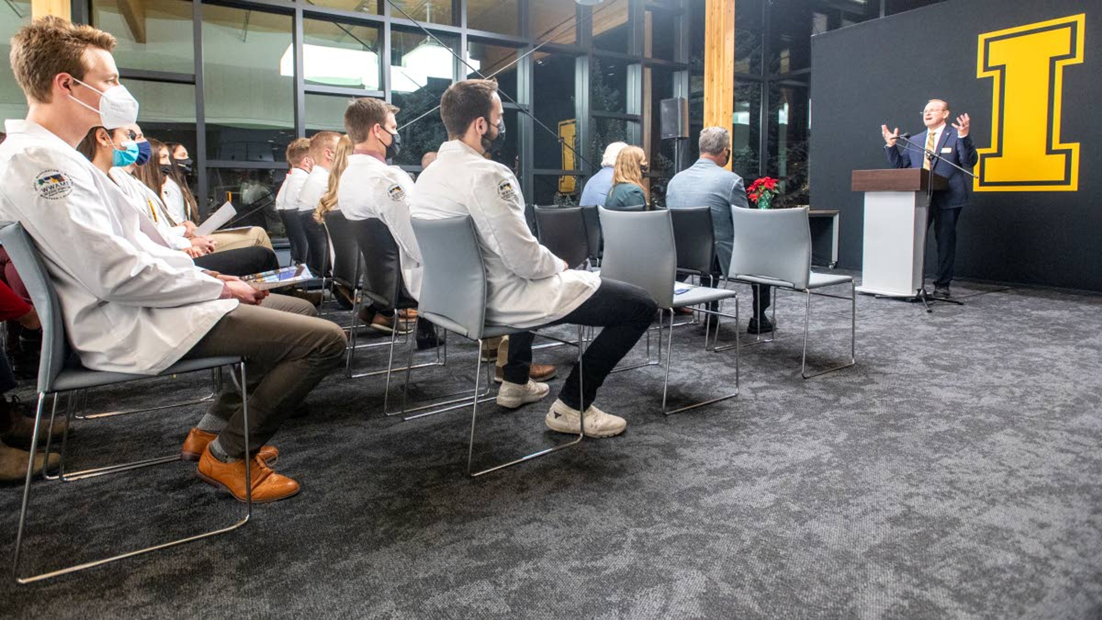 Director Jeff Seegmiller, of WWAMI Medical Education Program, speaks to a crowd of medical students prior to a ribbon cutting in honor of the new Norco classroom at the WWAMI Medical Education Building in Moscow on Monday night.