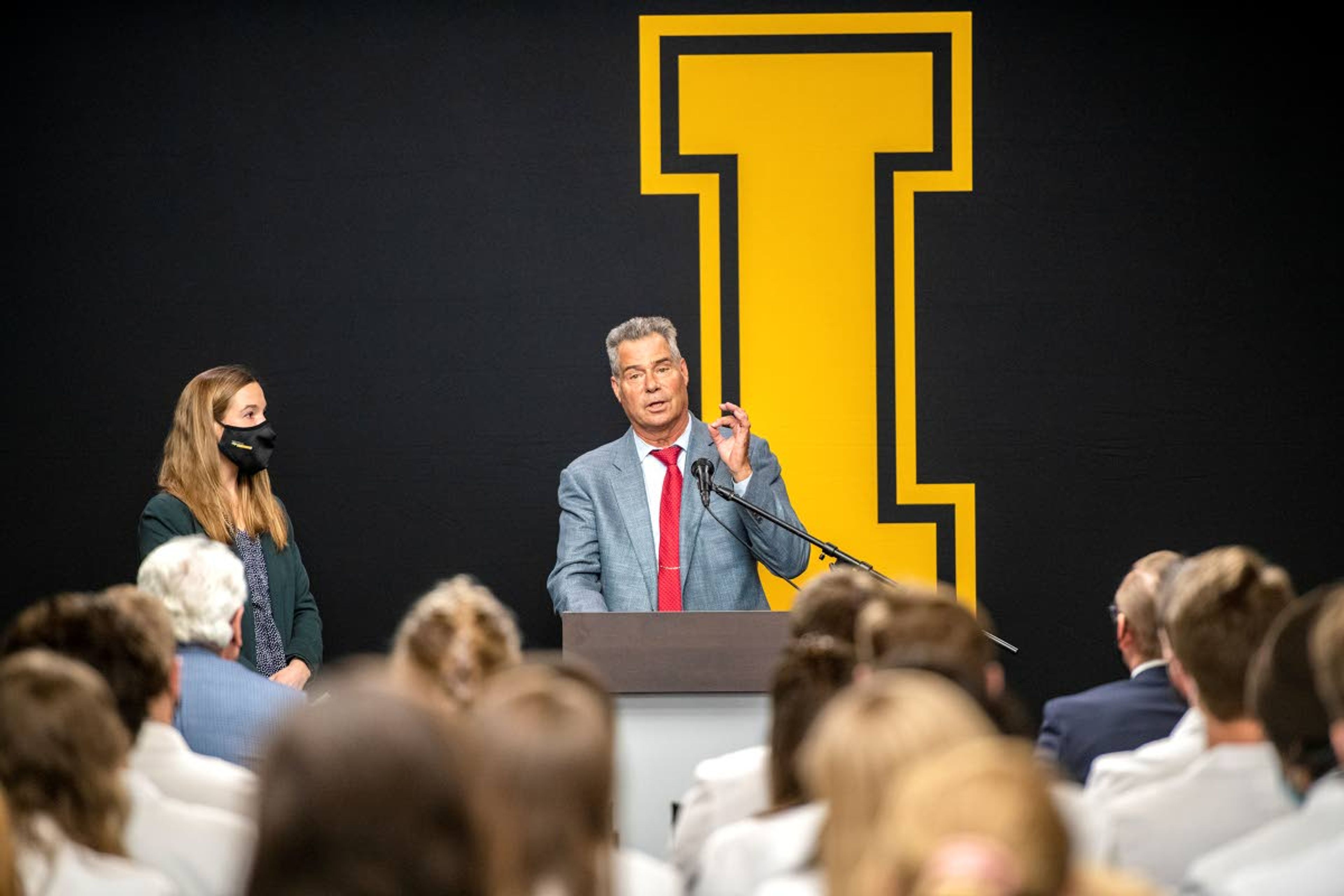 Norco’s Chairman of the Board Jim Kissler speaks to a crowd of medical students prior to a ribbon cutting in honor of the new Norco classroom at the WWAMI Medical Education Building in Moscow on Monday night.