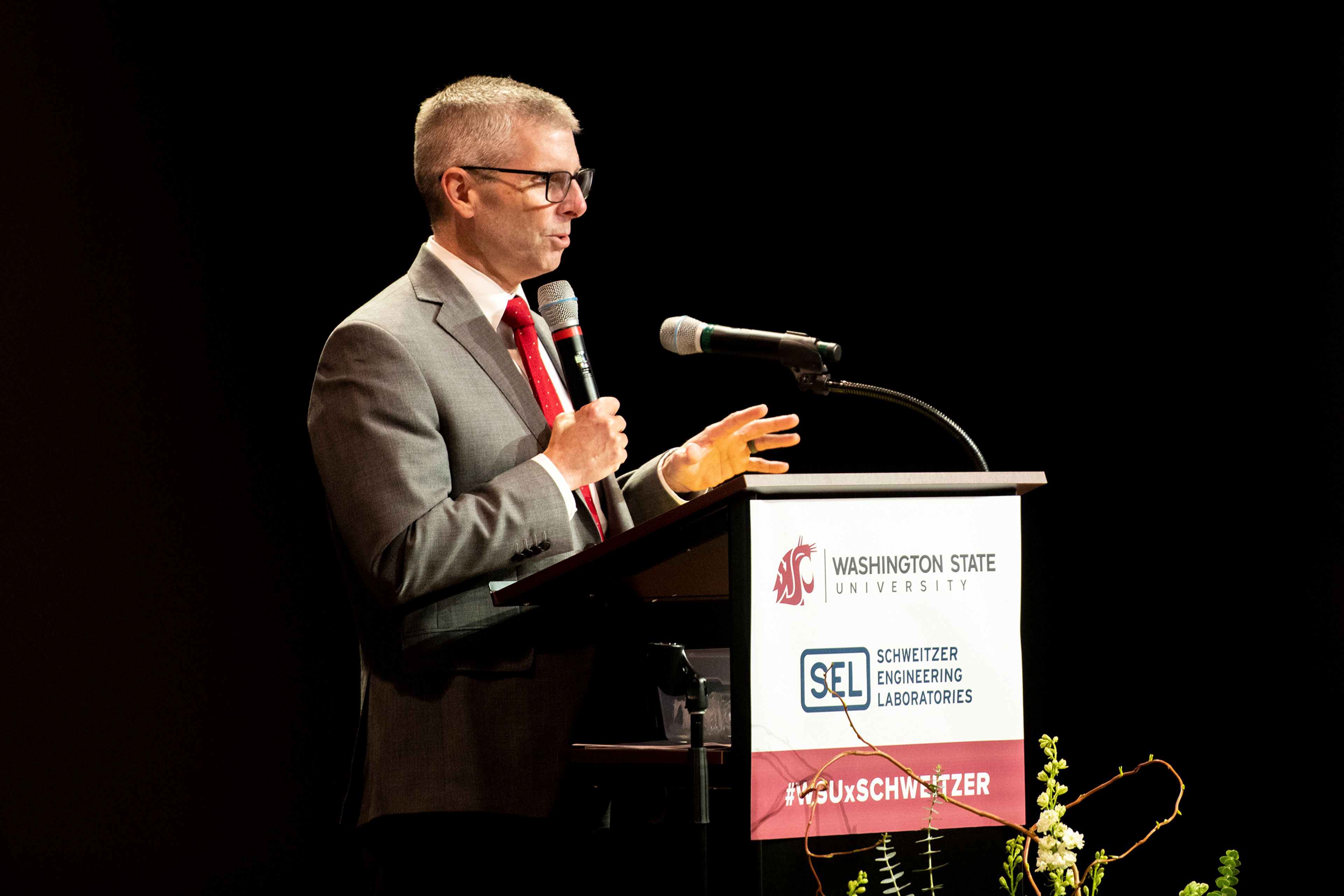 Schweitzer Engineering Laboratories Chief Executive Officer David Whitehead speaks to an audience about the long-standing relationship between SEL and Washington State University.