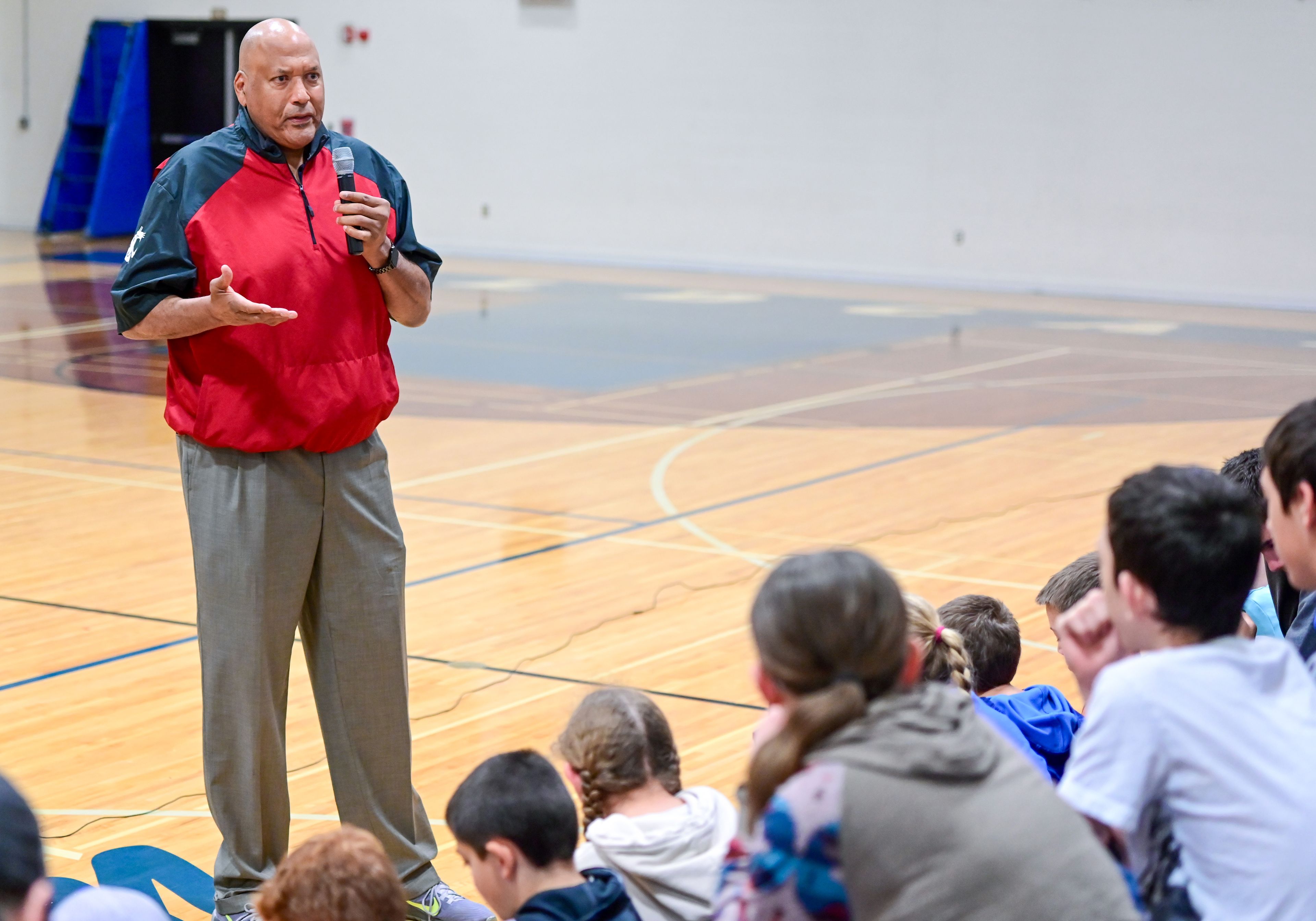 Former NBA and WSU athlete James Donaldson speaks to students at Colton High School about mental health on Tuesday.