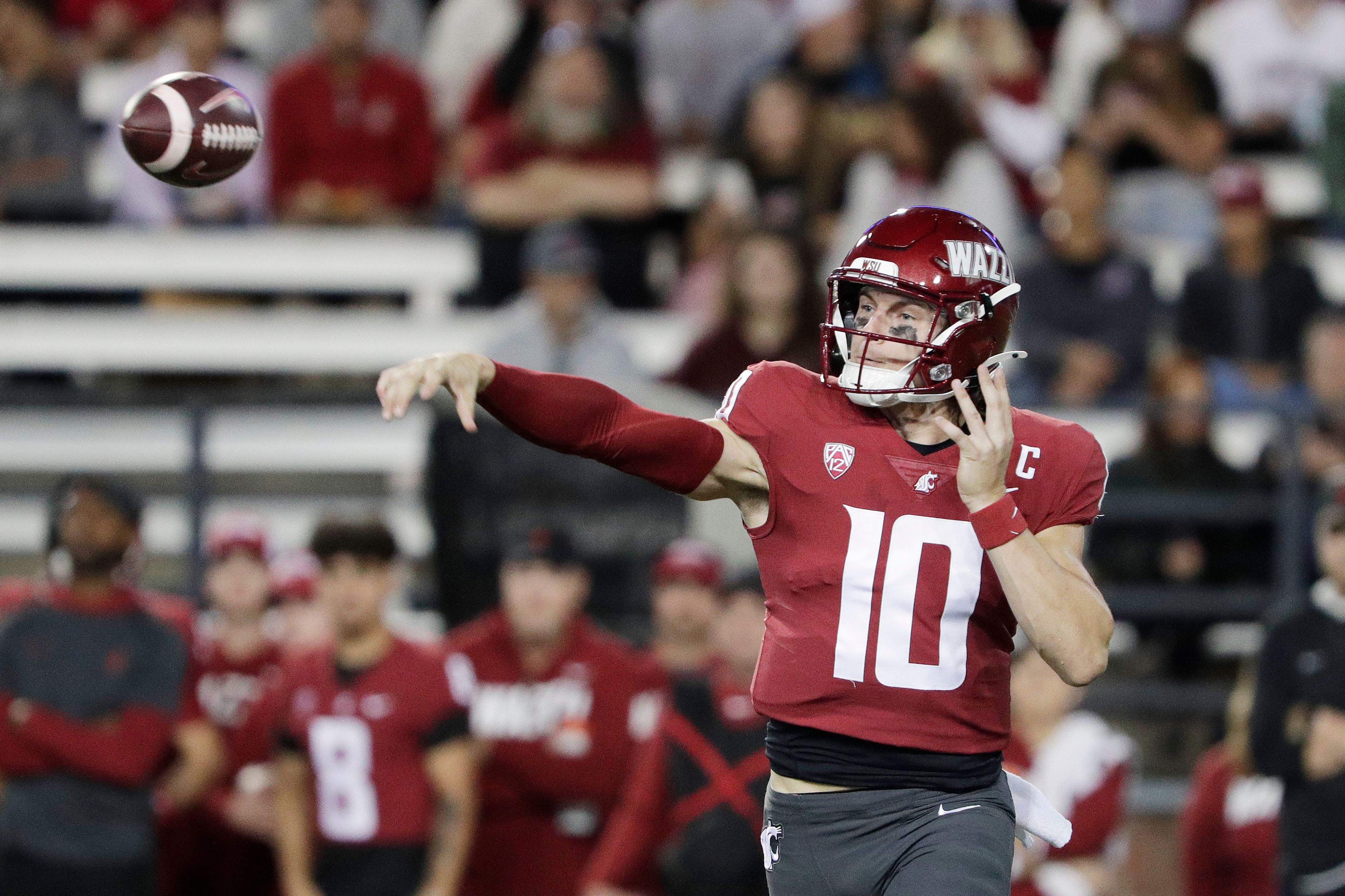 Washington State quarterback John Mateer throws a pass during the first half of an NCAA college football game against San Jose State, Friday, Sept. 20, 2024, in Pullman, Wash. (AP Photo/Young Kwak)