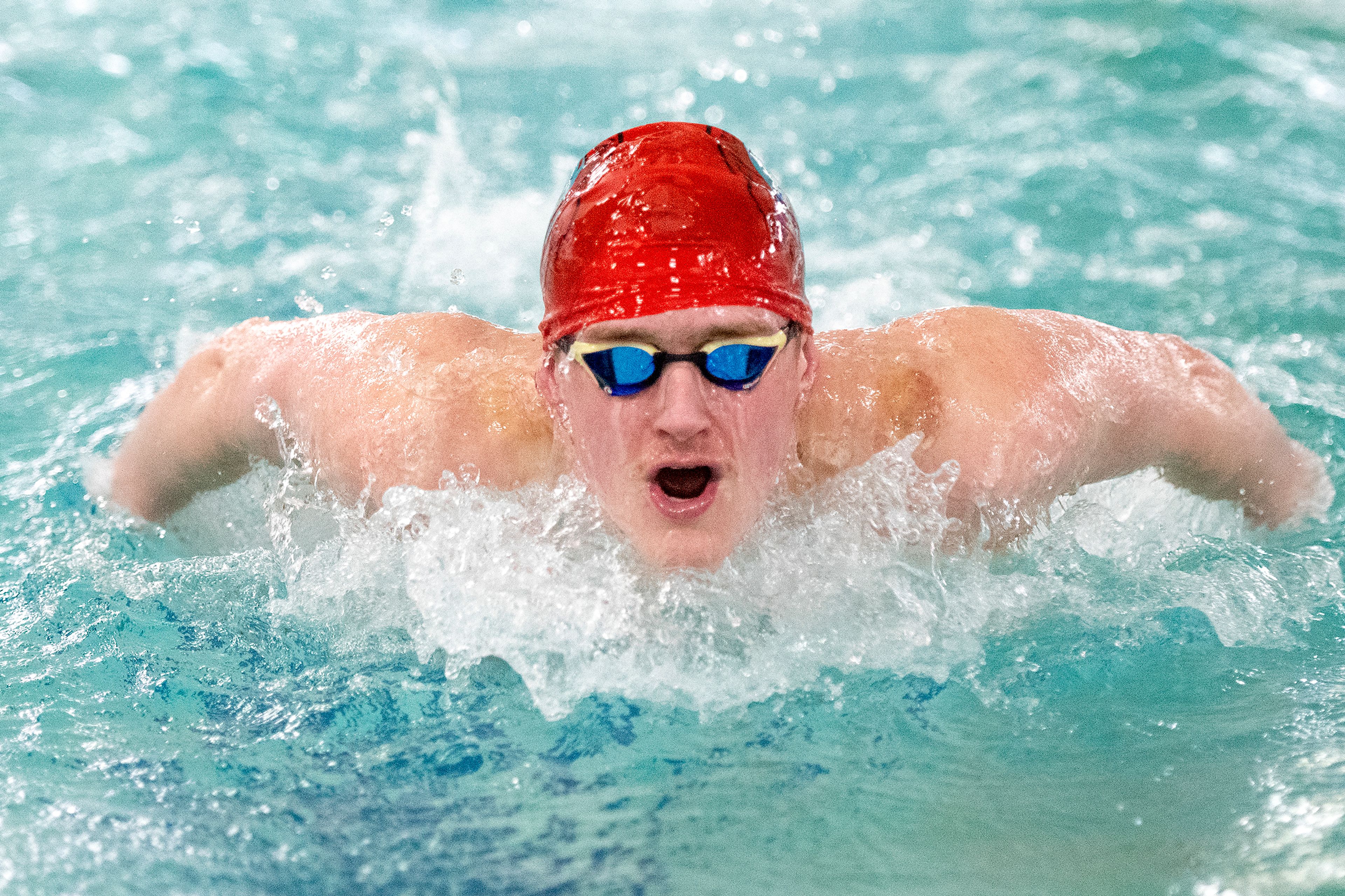 Pullman’s Jake McCoy practices the butterfly stroke Tuesday at the Pullman Aquatic Center.