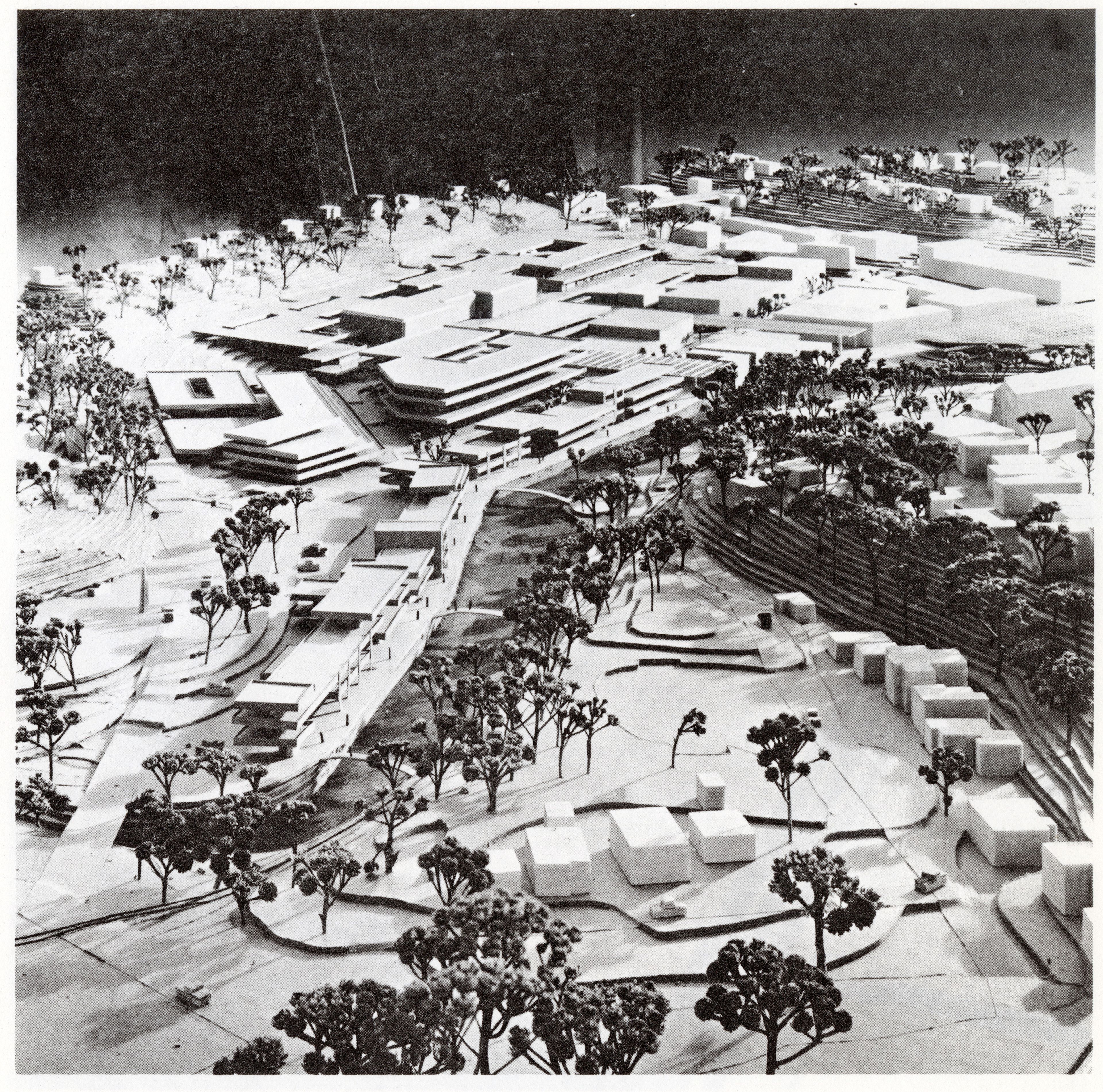 A pedestrian shopping promenade runs along the riverfront, connecting downtown to the University in this design idea for downtown Pullman created in 1968.