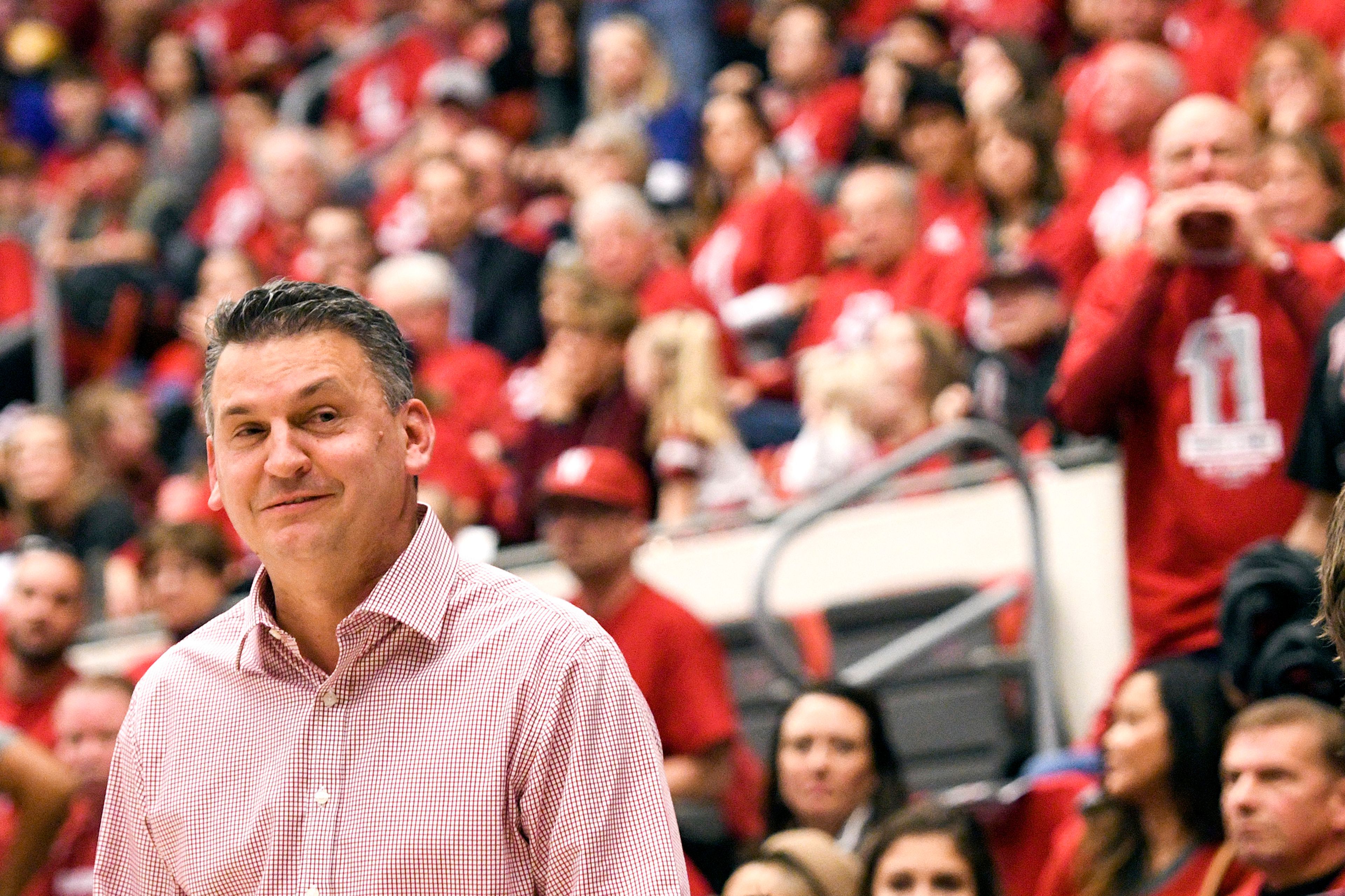 Washington State coach Kyle Smith smiles at a referee after arguing with the same referee about a charging call on forward Jeff Pollard during the second half of a Pac-12 Conference game on Nov. 8, 2020, at Beasley Coliseum in Pullman.