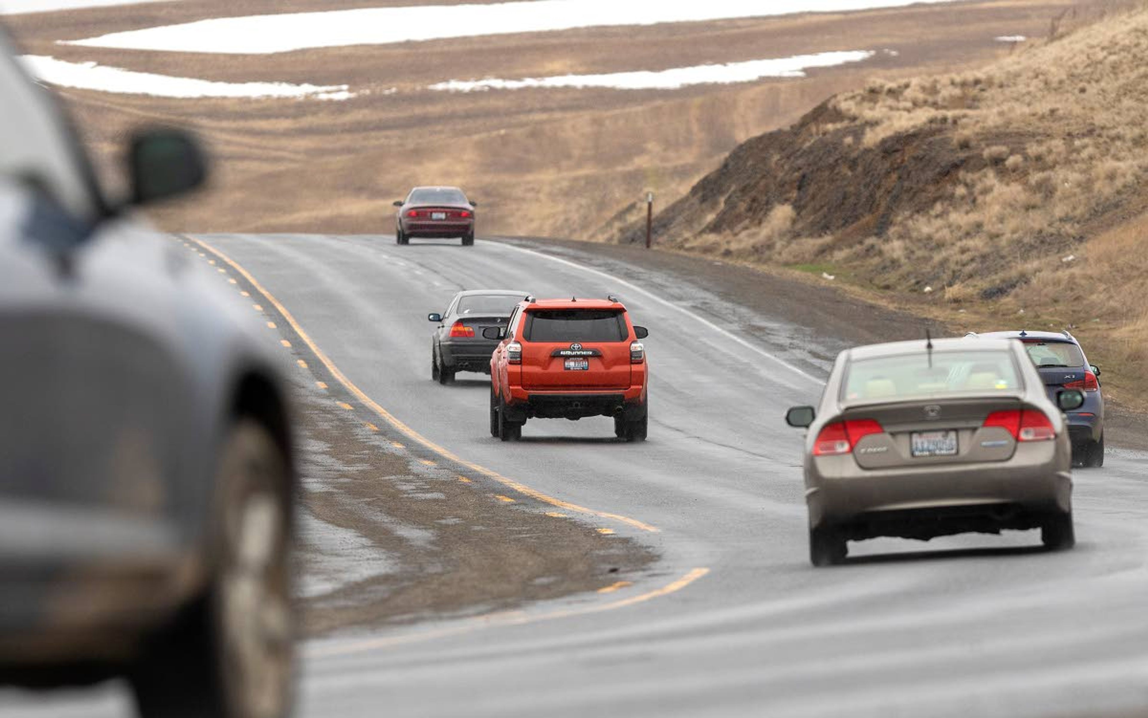 Cars drive on State Route 270 on Wednesday between Pullman and Moscow. The Pullman Police Department is reminding motorists to drive in the right lane except when passing another vehicle.