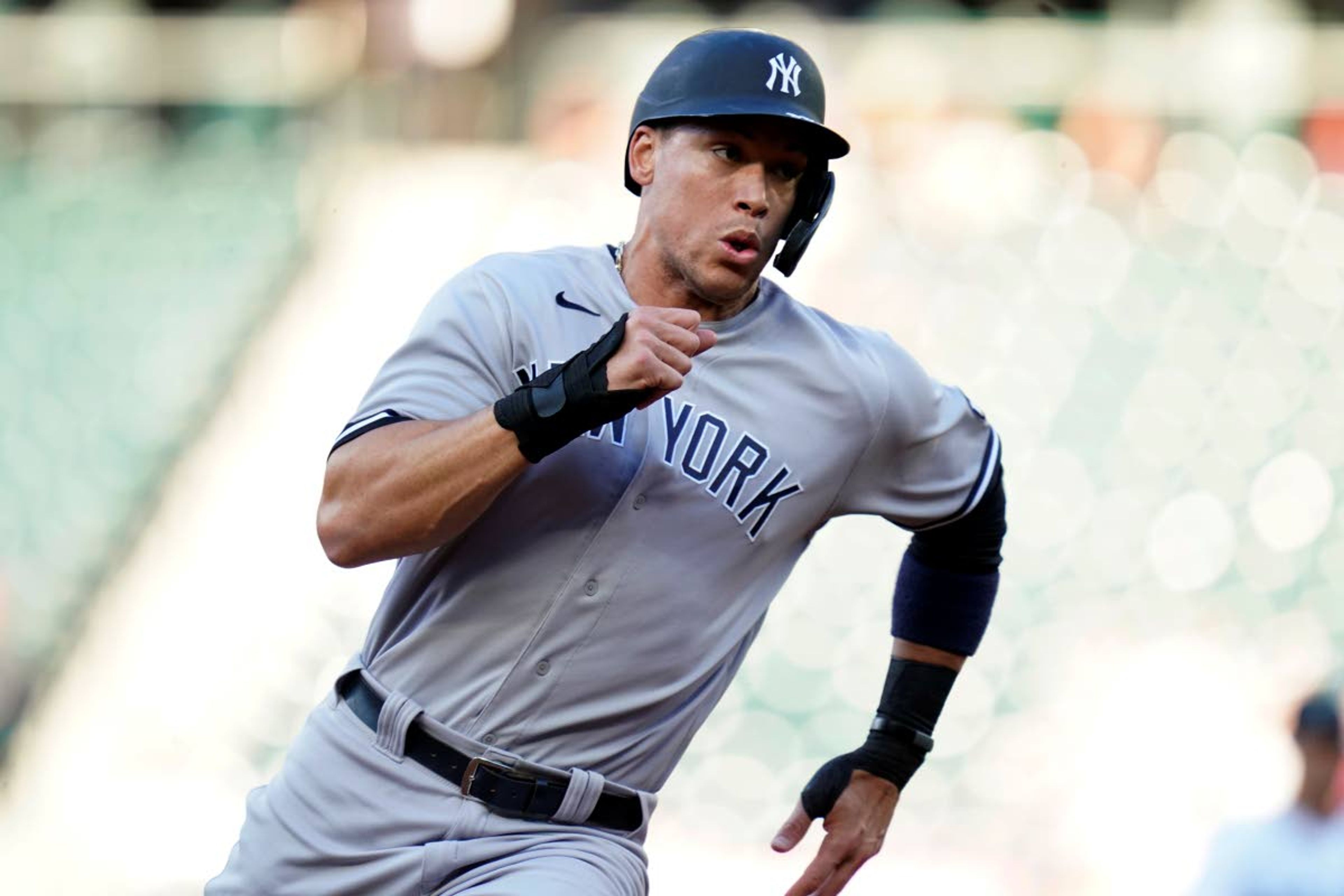 New York Yankees' Aaron Judge races home to score against the Seattle Mariners during the first inning of a baseball game Wednesday, July 7, 2021, in Seattle. (AP Photo/Elaine Thompson)