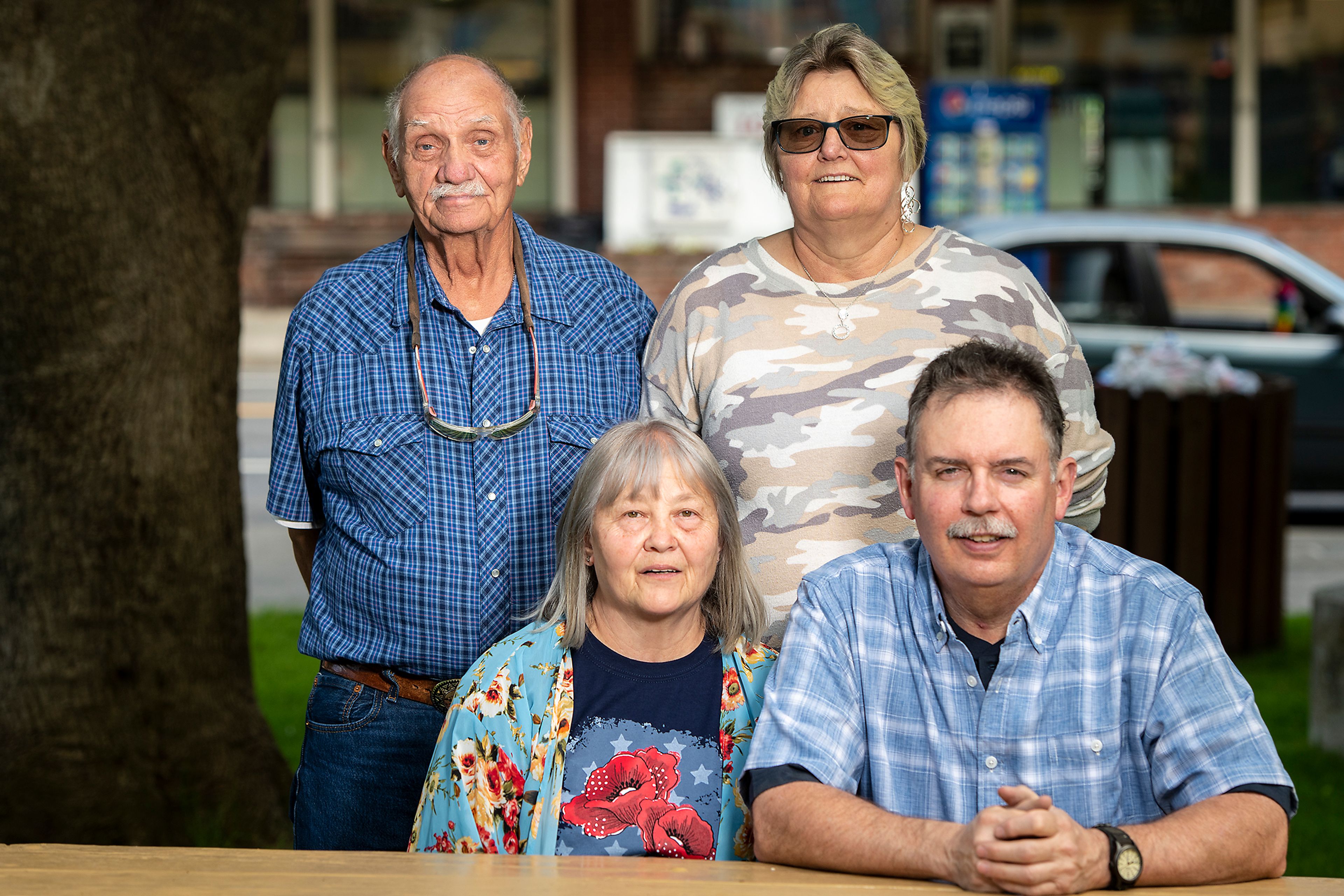 Zach Wilkinson/Daily News Locust Blossom Festival grand marshals Ray and Theo Dygert, back row, of Juliaetta, and Rose and Val Norris, of Kendrick, pose for a portrait Wednesday at Kendrick City Park.