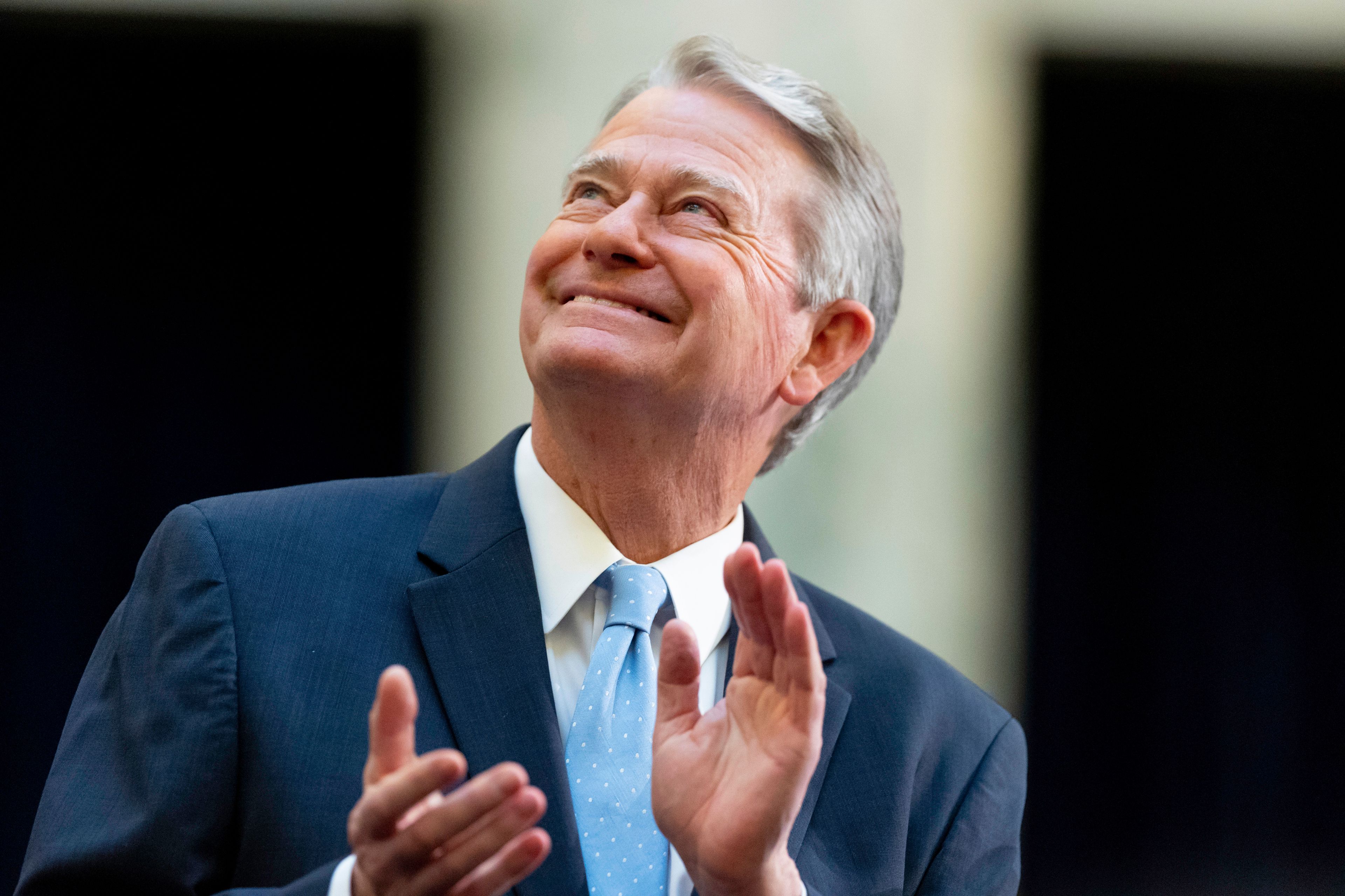 Idaho Gov. Brad Little claps during a pause in his 2023 State of the State address held at the Idaho State Capitol, Monday, Jan. 9, 2023, in Boise, Idaho. (AP Photo/Kyle Green)