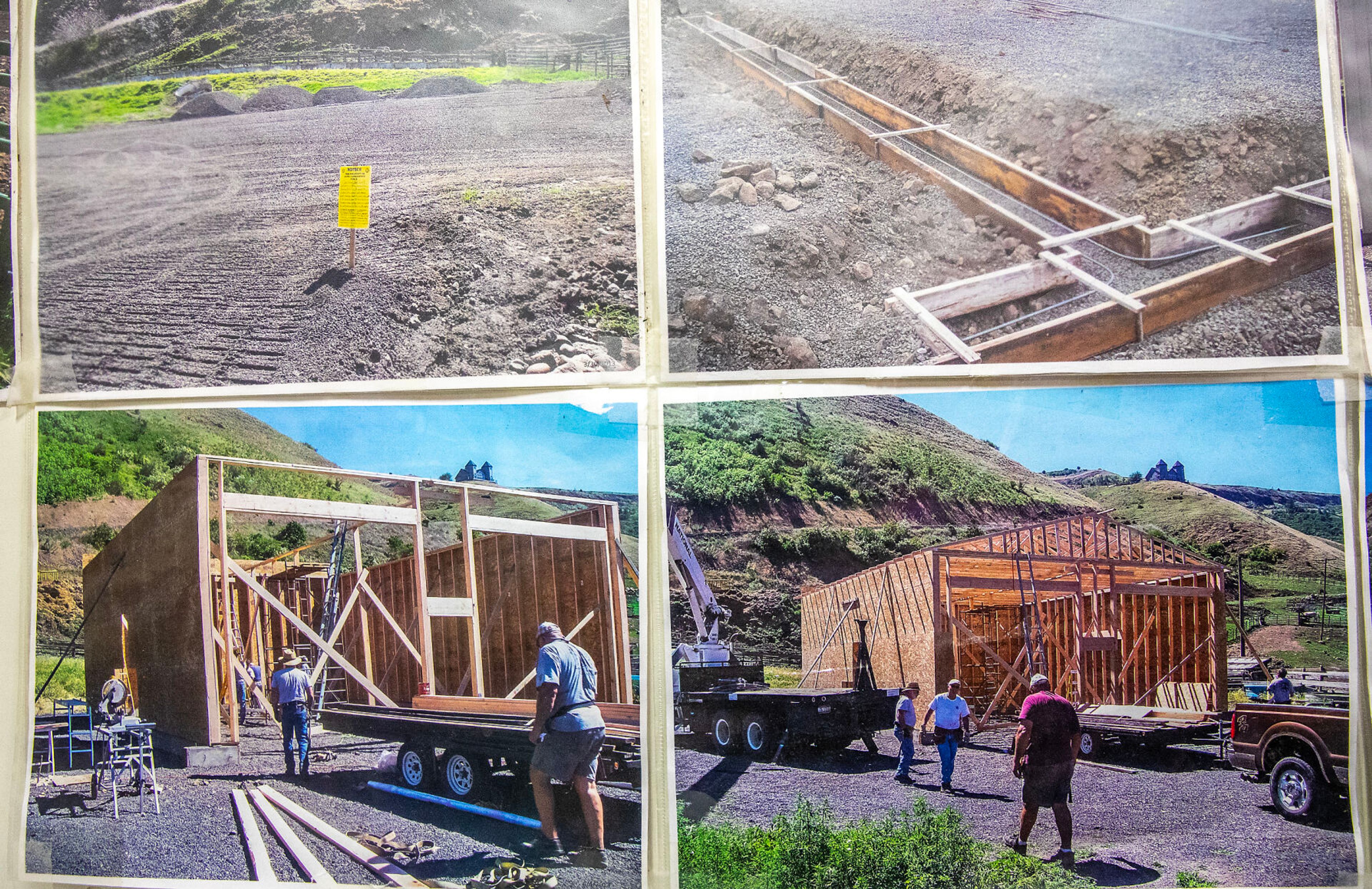 Pictures of construction of the Arrow Junction Fire Protection District hang on the wall Friday.