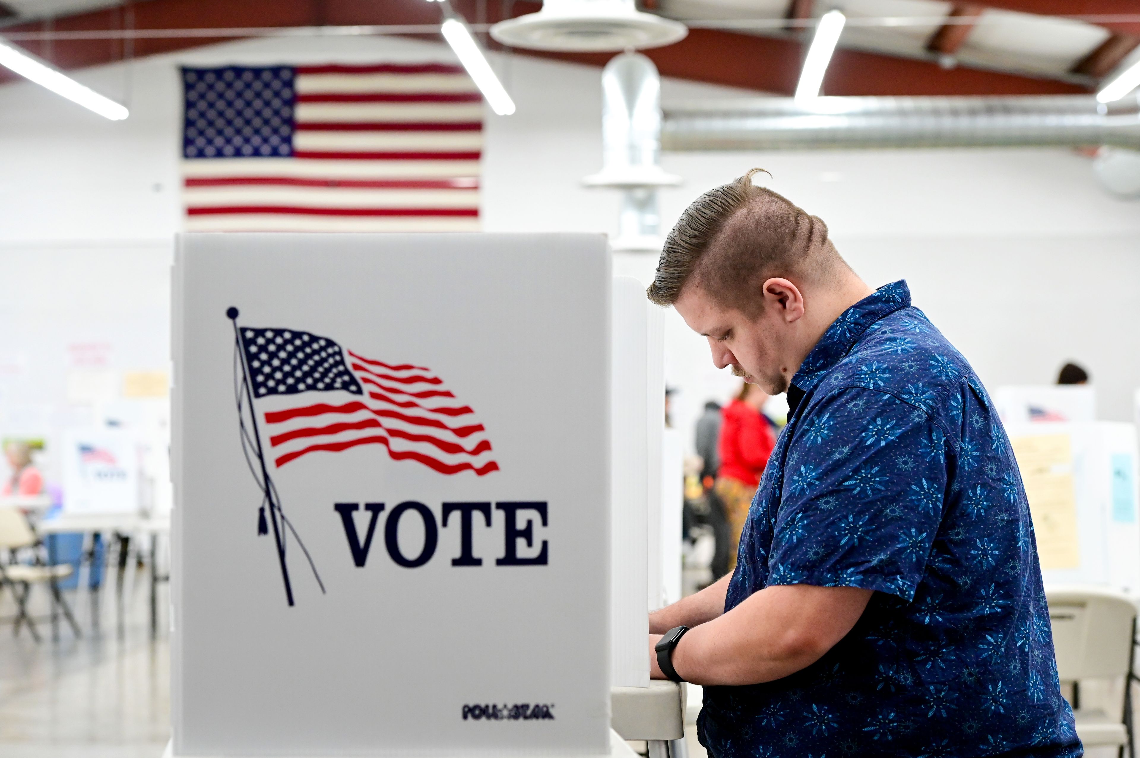 Zachary Thomas fills out a ballot at the Latah County Fairgrounds in Moscow on Election Day.