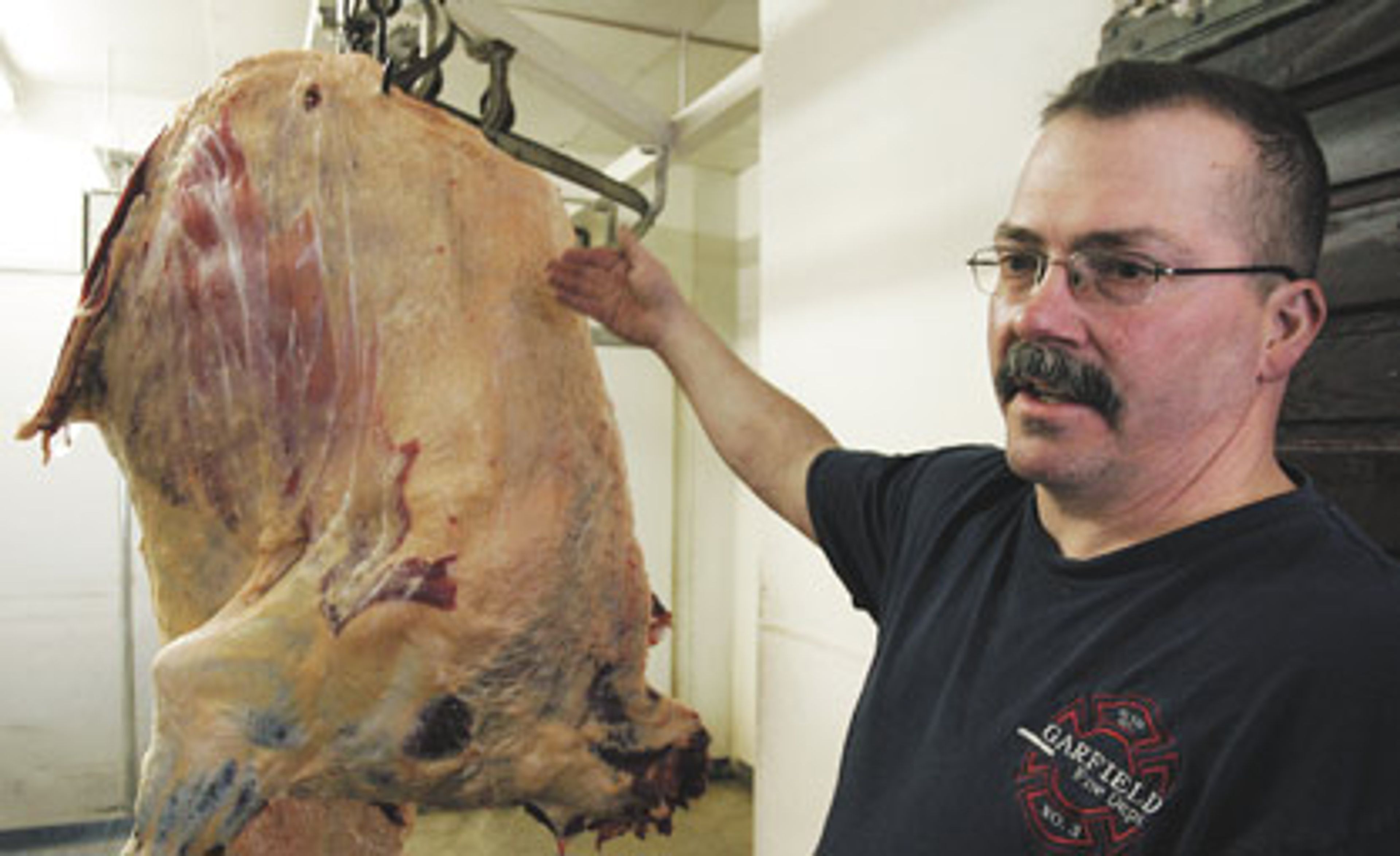 NEIGHBORS Taking the heat Garfield meat smoker survives close call,