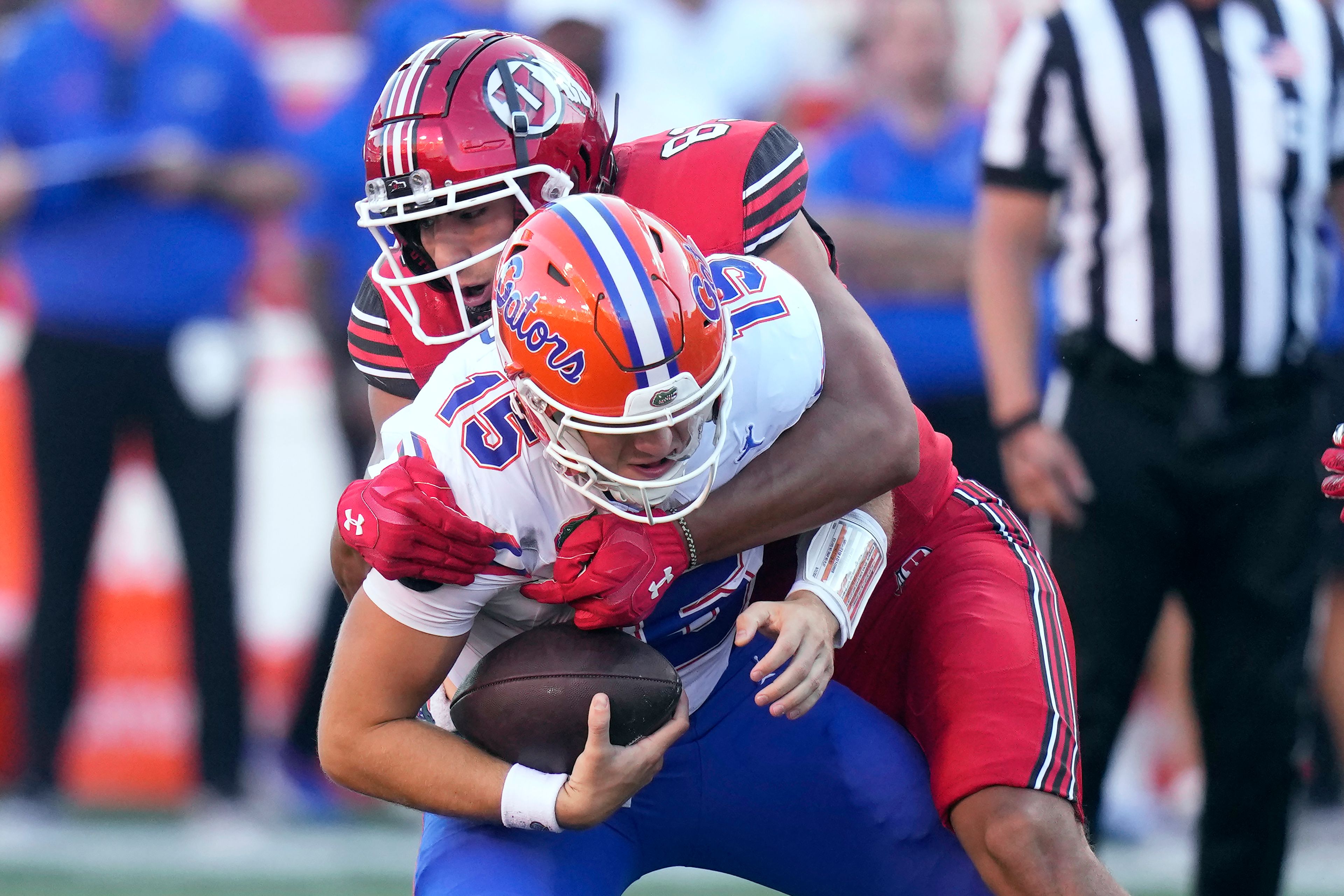 Utah defensive end Jonah Elliss (83) sacks Florida quarterback Graham Mertz (15) during the first half of an NCAA college football game Thursday, Aug. 31, 2023, in Salt Lake City. (AP Photo/Rick Bowmer)