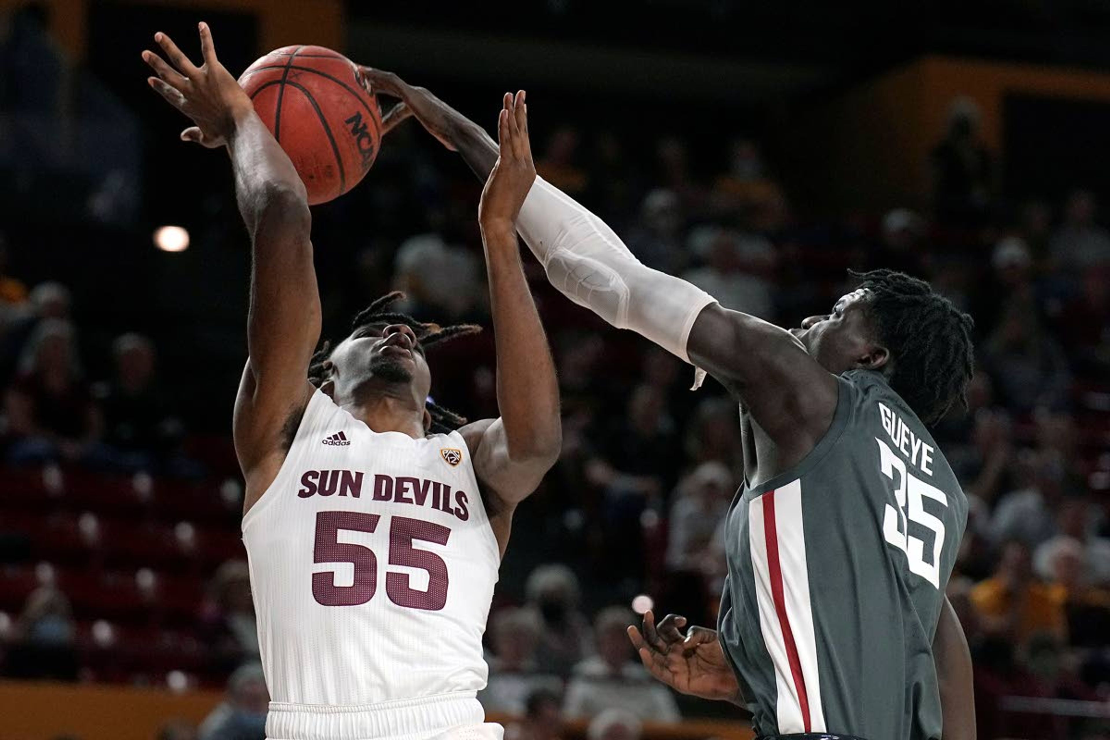 Associated PressWashington State forward Mouhamed Gueye blocks a shot by Arizona State forward Jamiya Neal during the second half of Wednesday’s game in Tempe, Ariz. The Cougars held the Sun Devils to just 21 percent shooting to win the Pac-12 opener for both teams, 51-29.