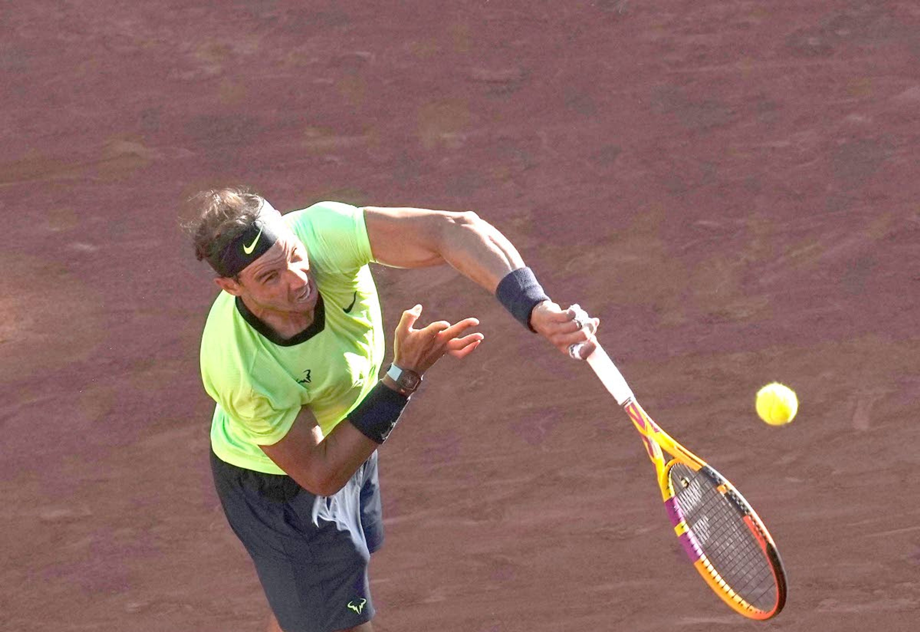 Associated PressSpain’s Rafael Nadal serves to Australia’s Alexei Popyrin during their first round match on Day 3 of the French Open tournament Tuesday at Roland Garros in Paris, France.