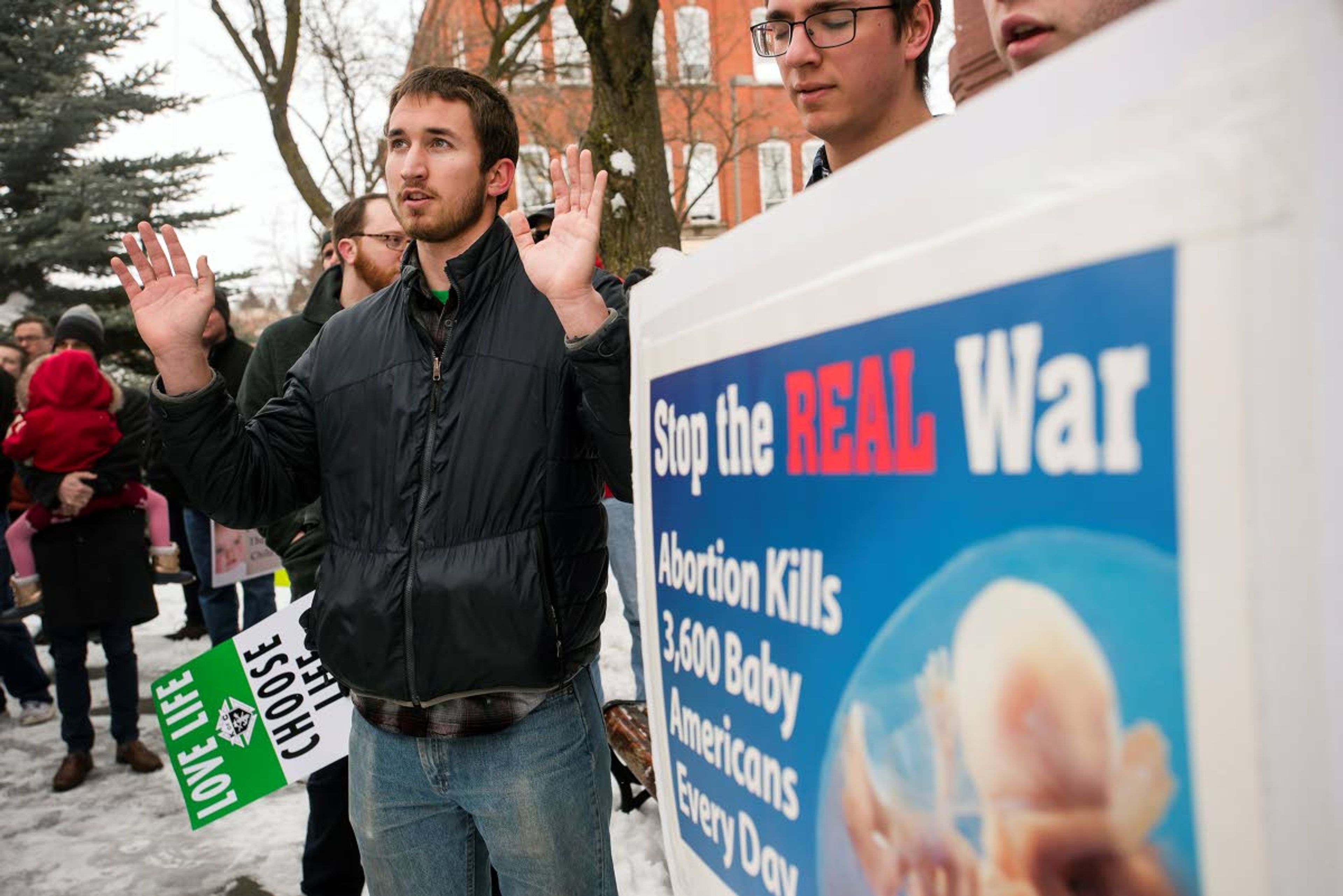 Sam Nyhus, of Moscow, sings at the conclusion of the 2020 March for Life at Friendship Square in Moscow on Saturday.