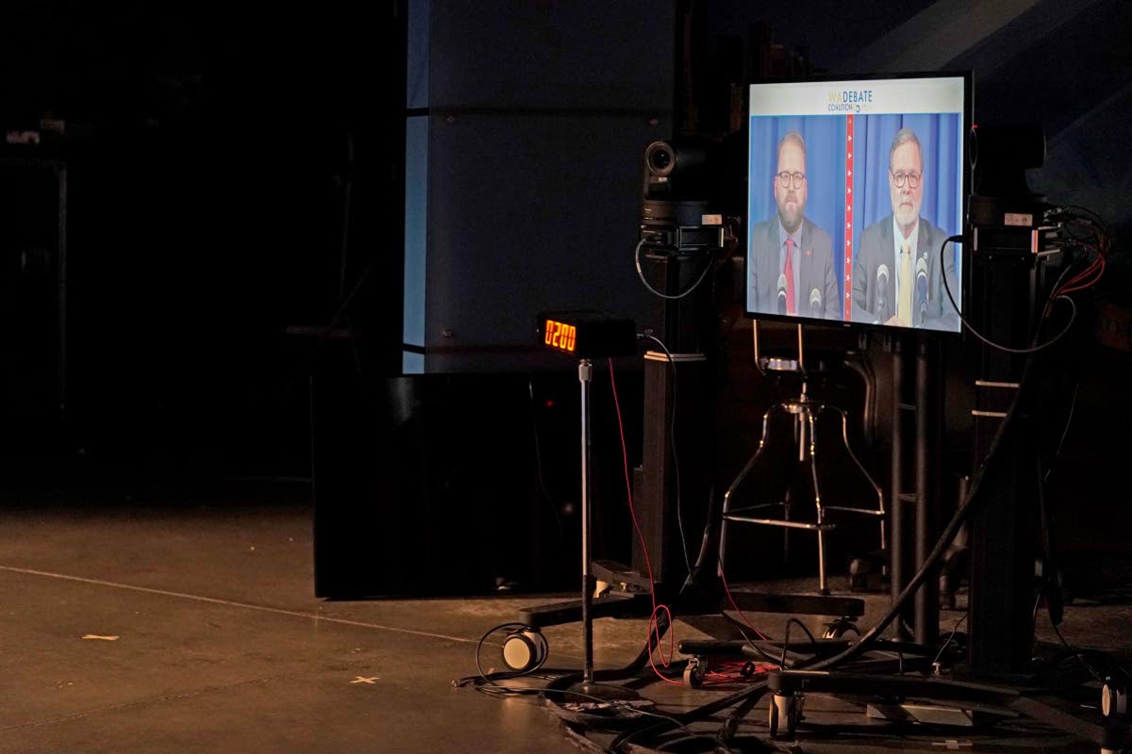 A video image is shown at right in a TVW studio during a debate between Sen. Marko Liias, D-Lynnwood, left, and U.S. Rep. Denny Heck, D-Wash., right, Thursday, Oct. 22, 2020, in Olympia, Wash., in the race for lieutenant governor of Washington state. (AP Photo/Ted S. Warren)