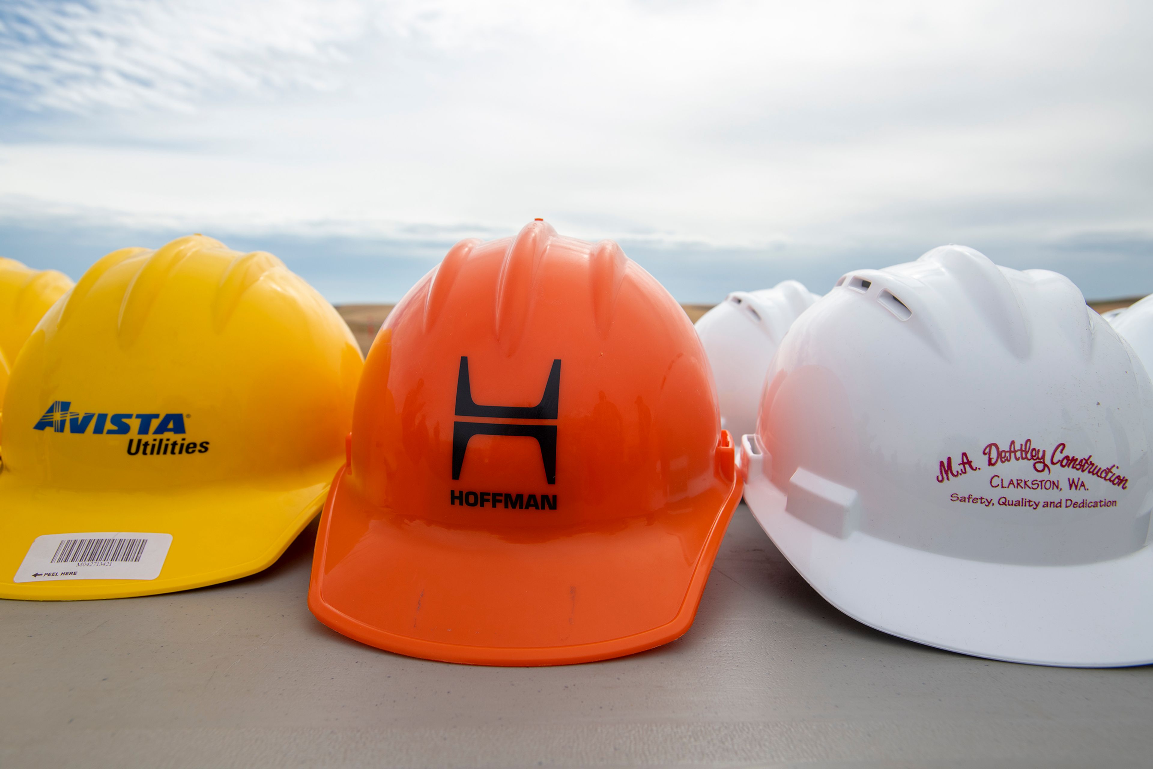 Hardhats line a table at a groundbreaking event for the new Pullman-Moscow Regional Airport terminal Wednesday in Pullman.