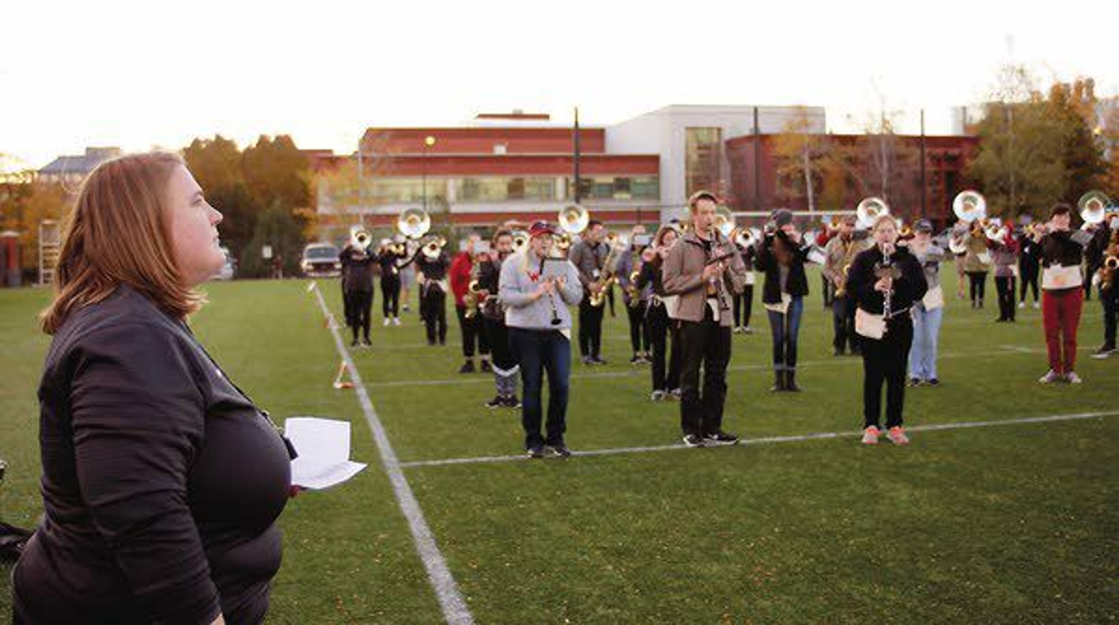 Washington State University Marching Band assistant director Sarah Miler listens to the band during rehearsal October 24.