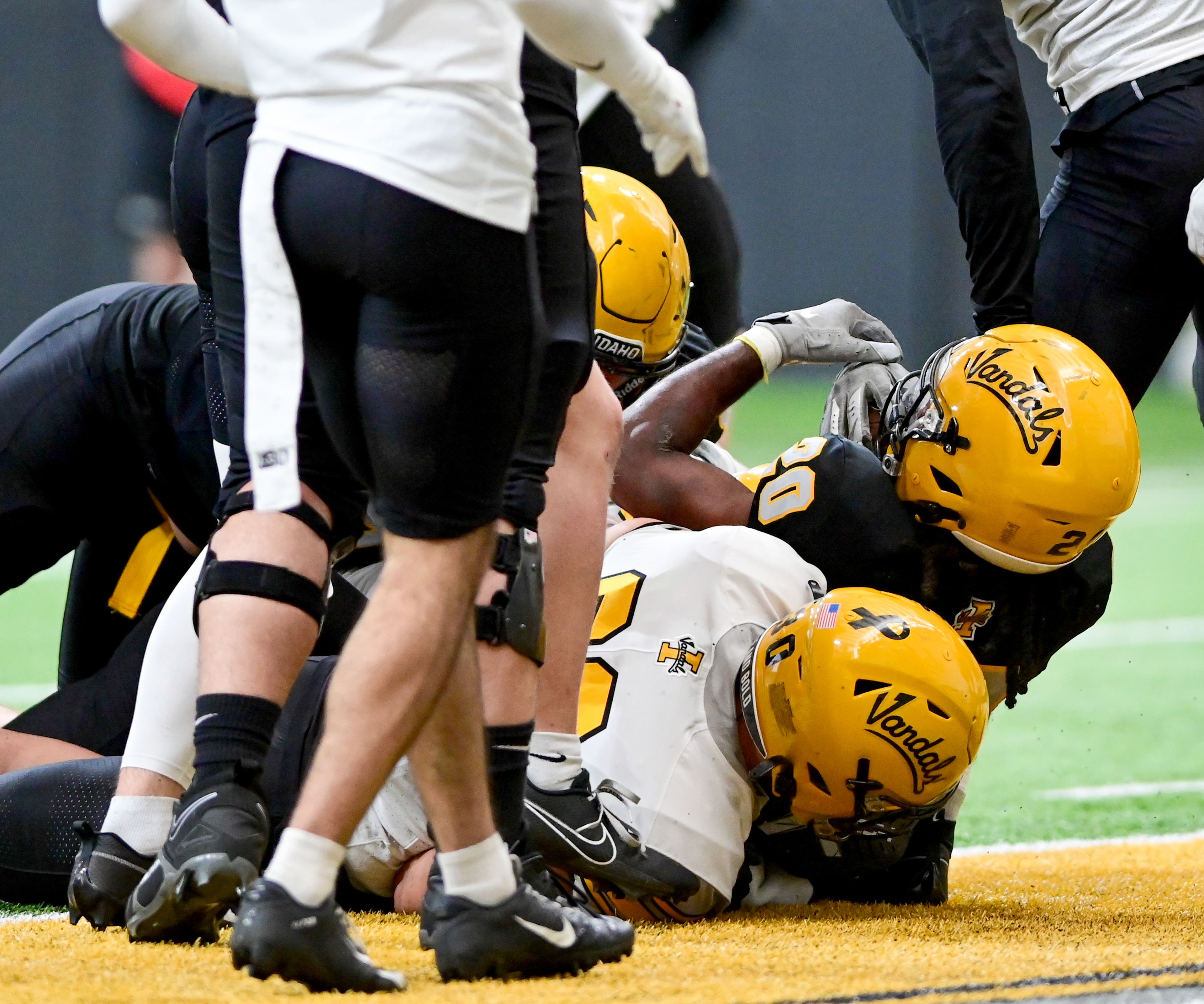 Vandals running back Elisha Cummings (20) lands in the end zone for a touchdown at the annual spring game at the P1FCU Kibbie Dome in Moscow on Friday.