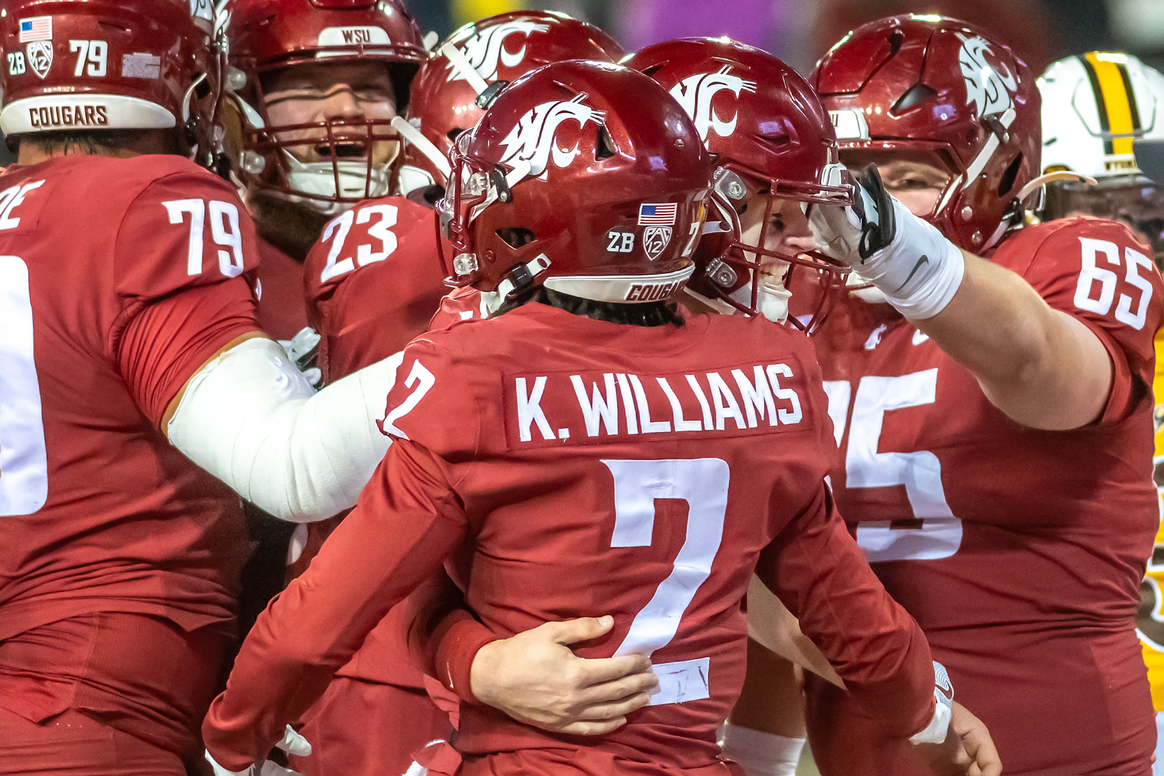 Washington State quarterback John Mateer celebrates a touchdown with Washington State wide receiver Kyle Williams during a quarter of a college football game on Saturday, at Gesa Field in Pullman.