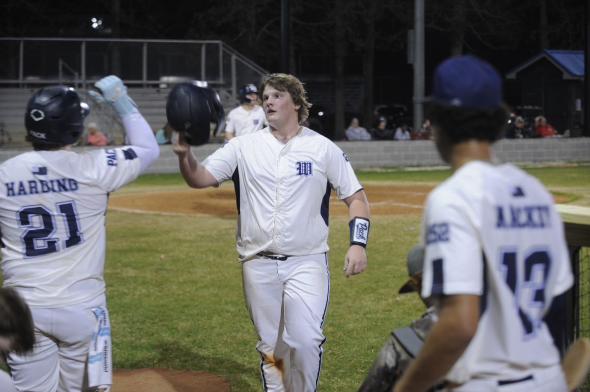 Washington completes comeback for first win of baseball seas...