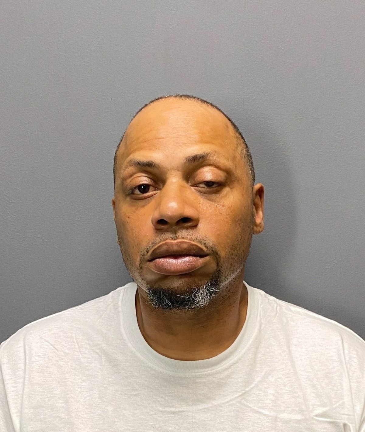 Murder suspect in Friday shooting turns himself into Suffolk Police