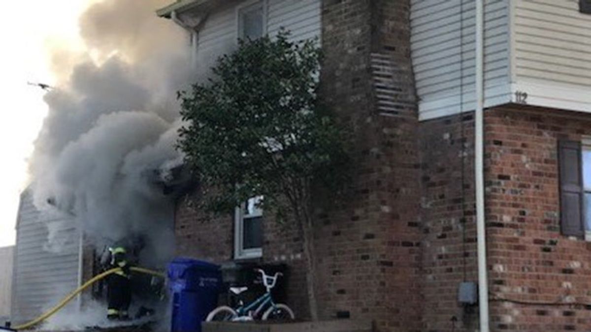 Three displaced in house fire