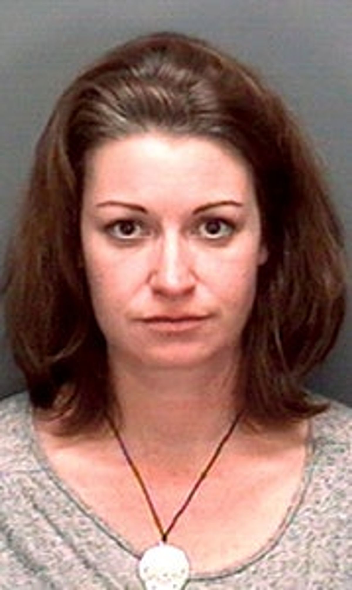 Woman charged with child abuse