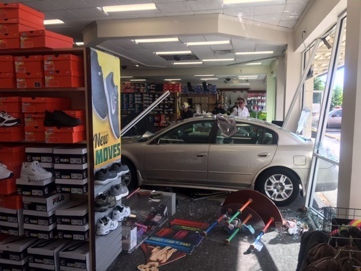 Car crashes into shoe store