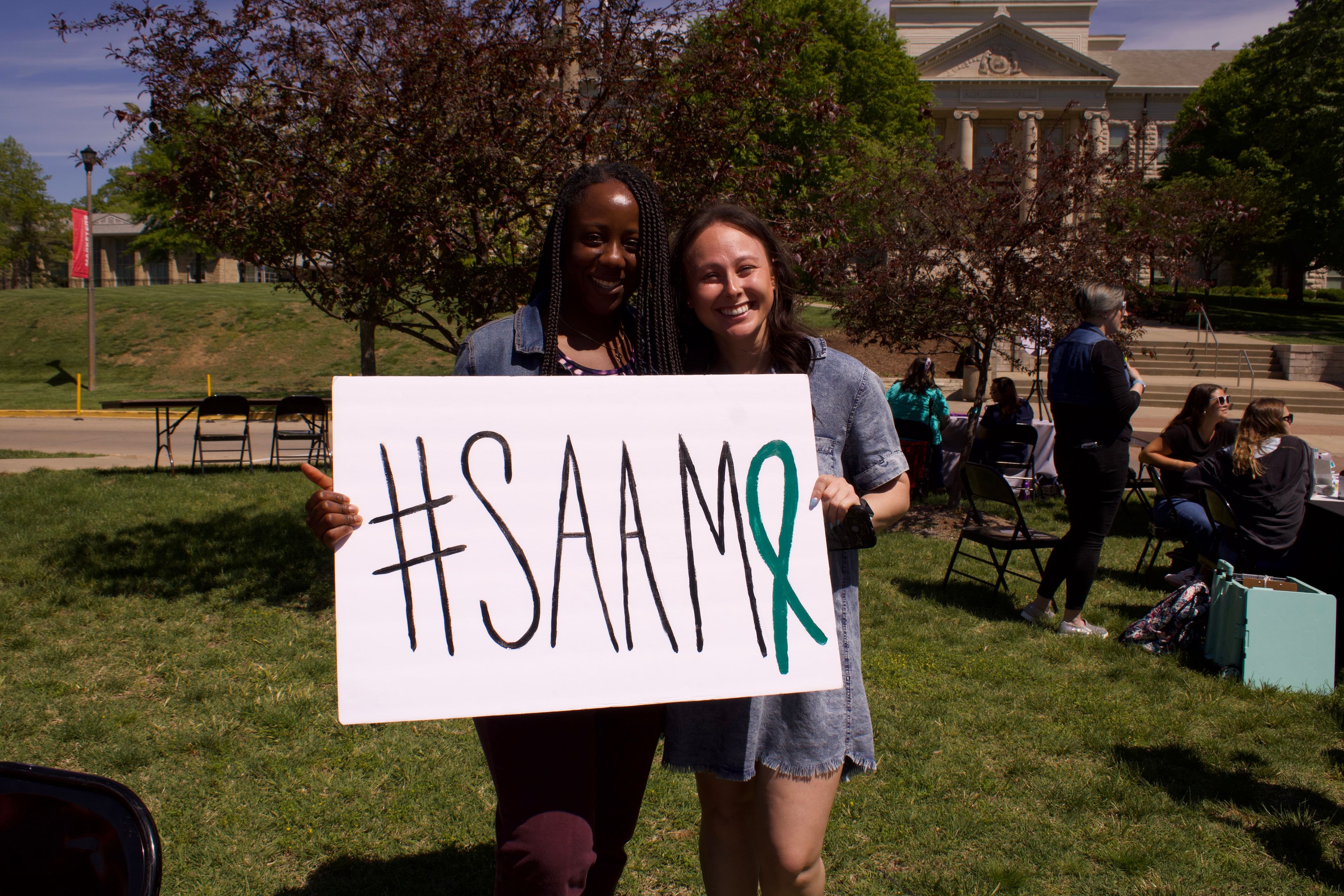 Students show their support for Sexual Assault Awareness Month. 