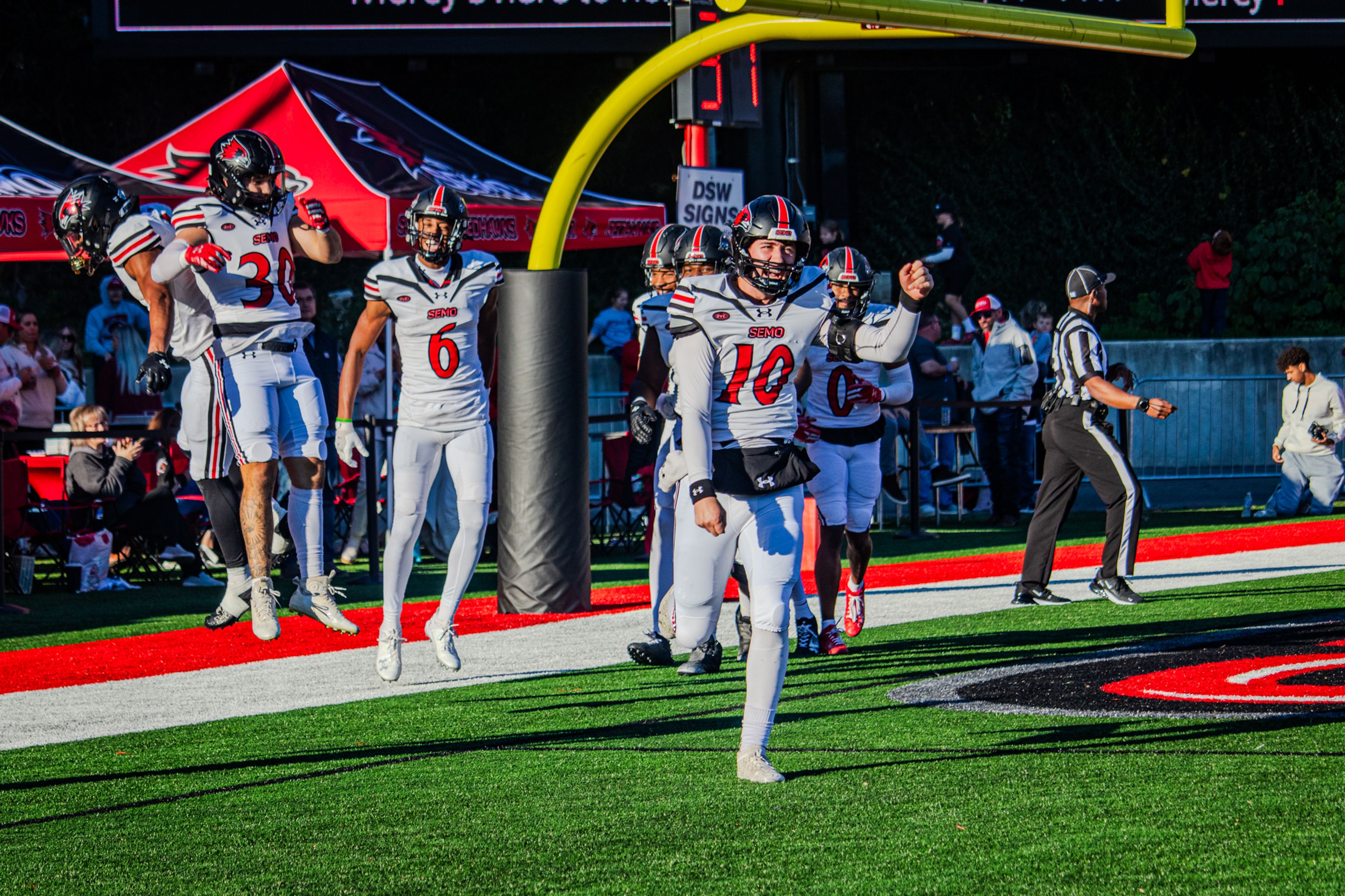 The SEMO football team celebrate in the end zone after scoring a touchdown against Western Illinois. 