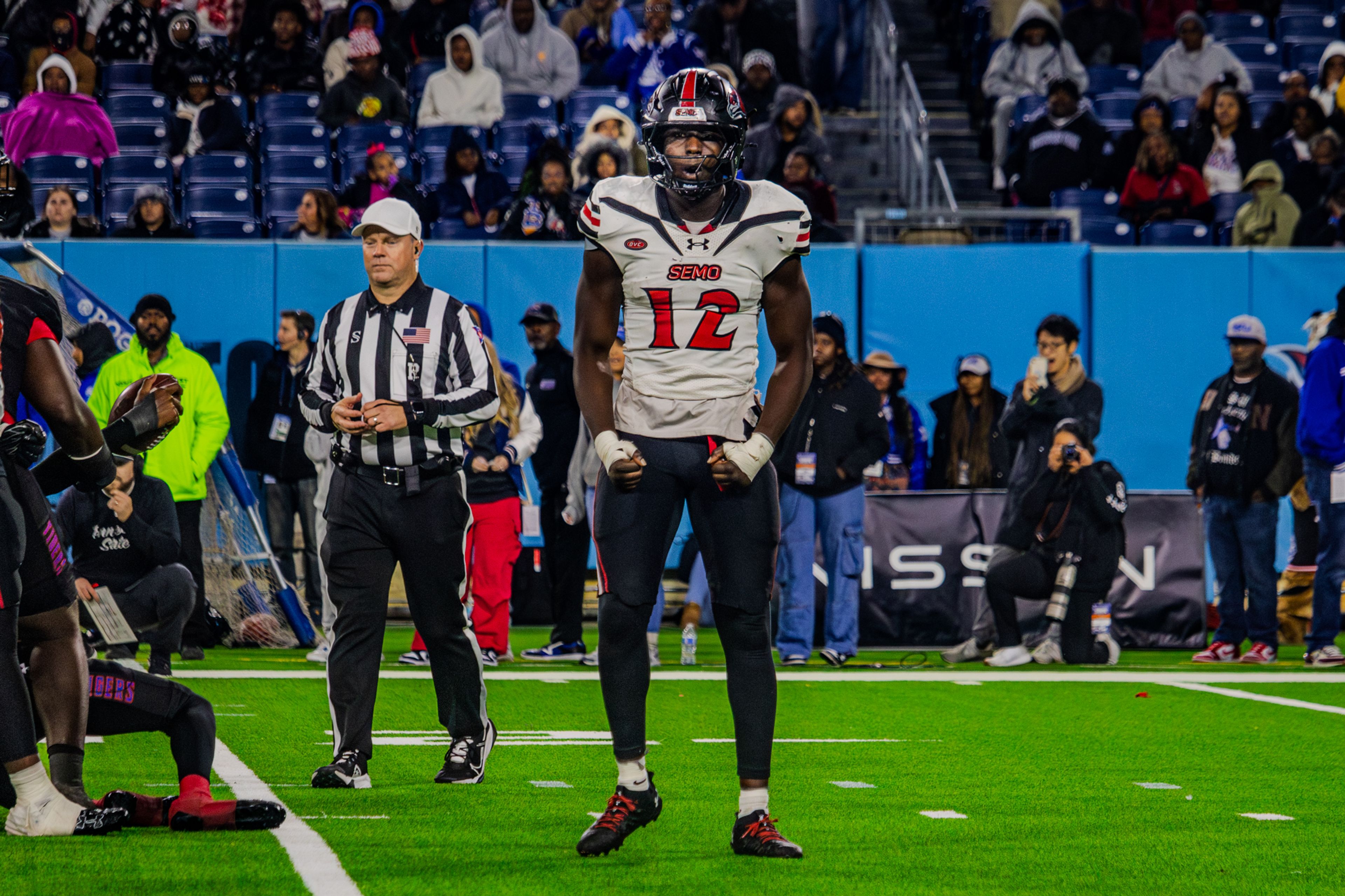 Senior outside linebacker Sam Cook celebrates after sacking TSU's quarterback. 