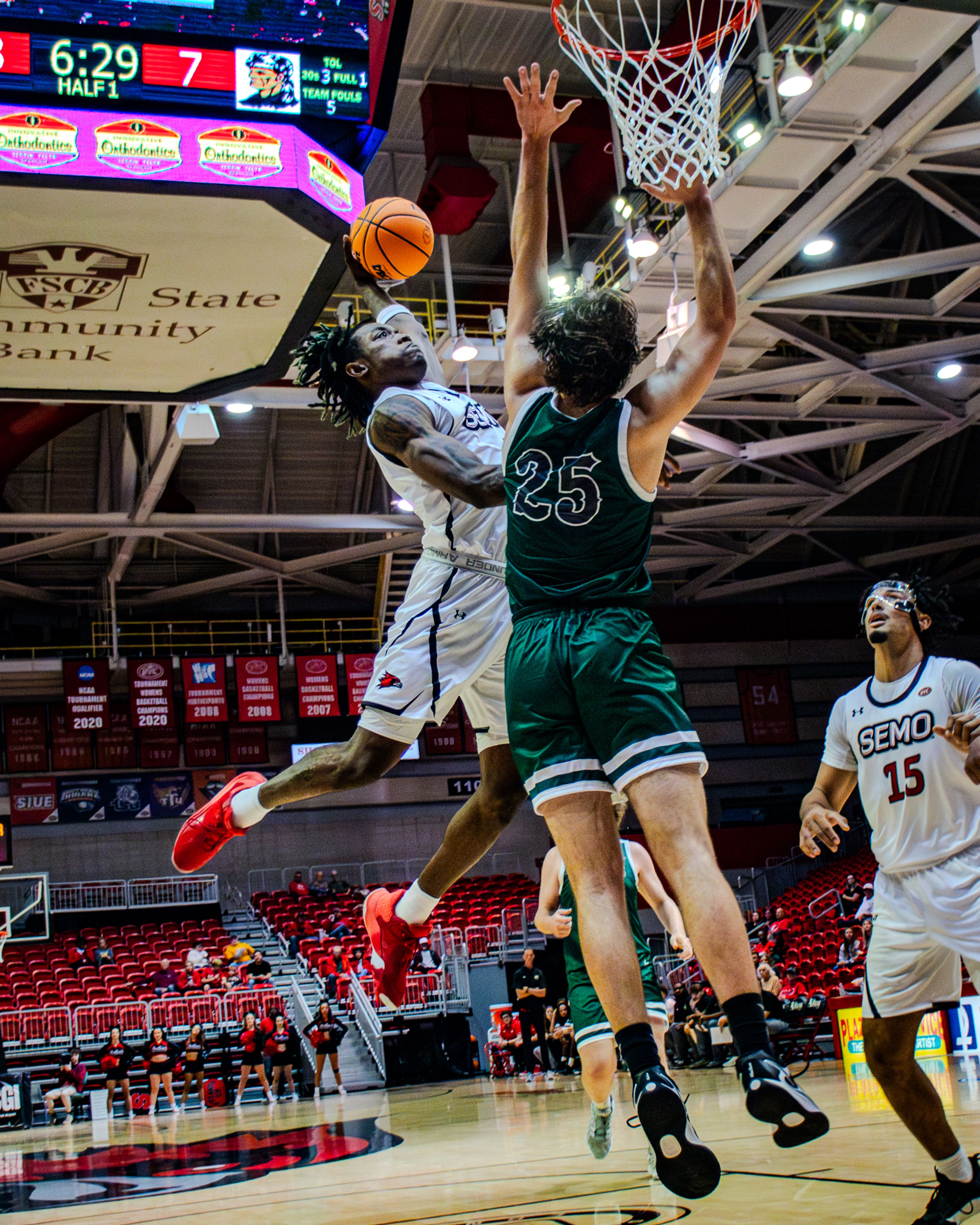 Junior guard Troy Cole Jr. attempts to dunk against Crowley Ridge College.