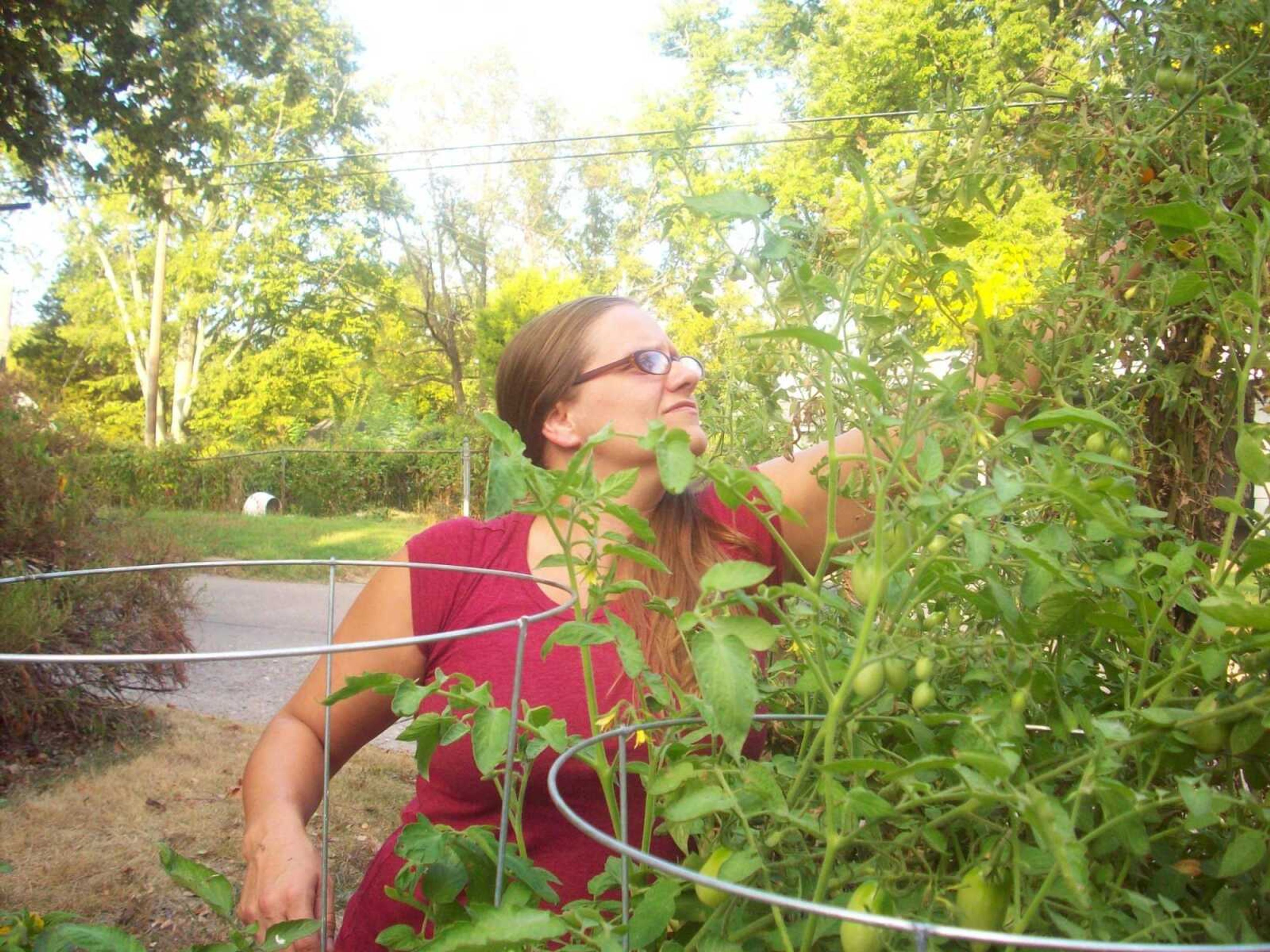 Nicole Maxfield relaxs from her busy life by taking care of the plants in her 
backyard. - Submitted photo