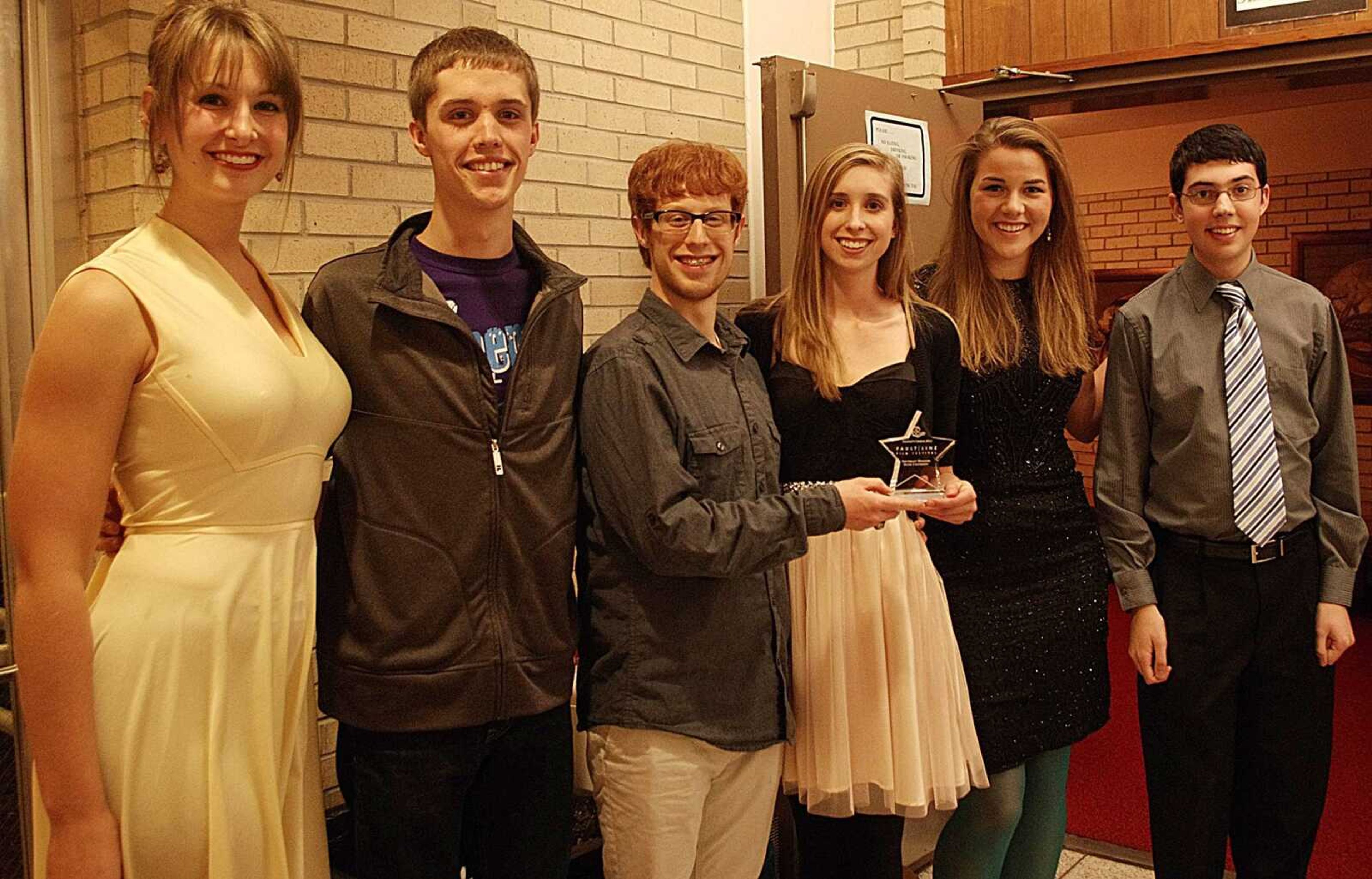 Part of the cast and director Amanda Sachtleben (second from right) of the short film "Blind Date" show their People's Choice Award, which they received on Nov. 16. Photo by Nathan Hamilton